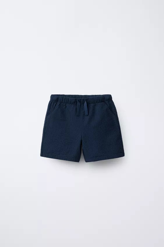 Shorts with elastic waistband and adjustable front drawstring. Front pockets and back patch pocke... | Zara US
