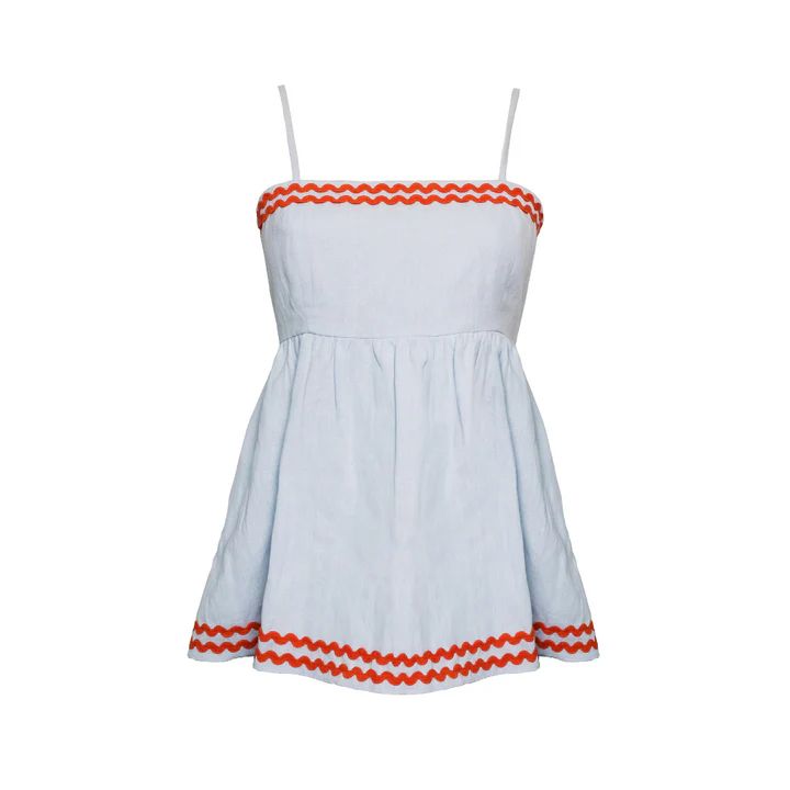 MASON'S DAUGHTER
PEPLUM TOP, SKY BLUE LINEN WITH RED RIC RAC | The Avenue