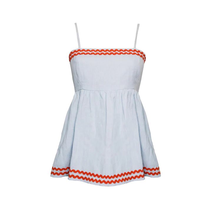 MASON'S DAUGHTER
PEPLUM TOP, SKY BLUE LINEN WITH RED RIC RAC | The Avenue