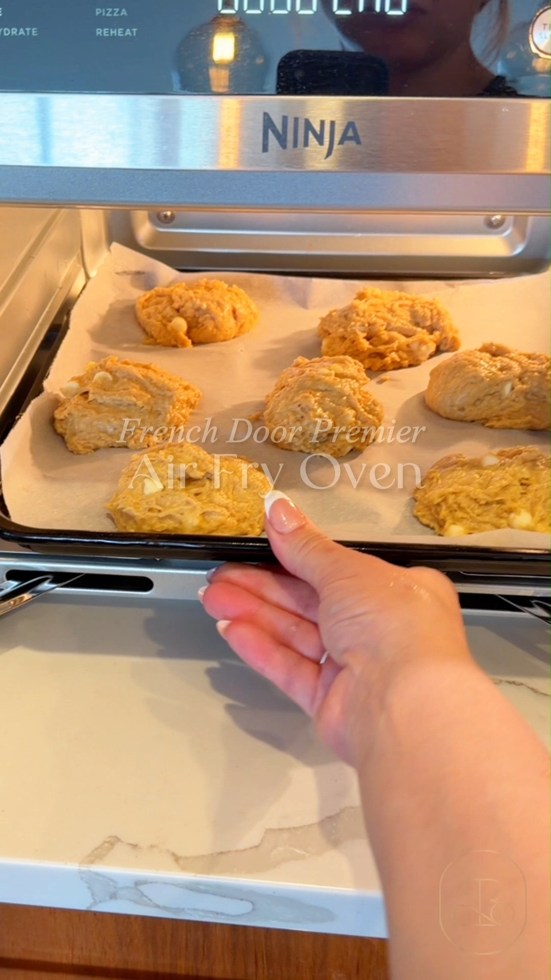 Feeding a hungry family fast shouldn't mean settling for soggy, microwave-reheated meals. The Ninja French Door Premier Air Fry Oven features a spacious 20.3-quart capacity and French doors that open easily with one hand for smooth loading. ✨ Perfect for busy parents, meal preppers, and larger households needing a fast, high-capacity countertop oven. 👩🏻‍🍳 #ninjakitchen #airfryeroven #frenchdooroven #kitchenappliances #kitchengadgets #bakingessentials  #kitchenorganization #smartcooking 

#LTKfoodie #LTKHome