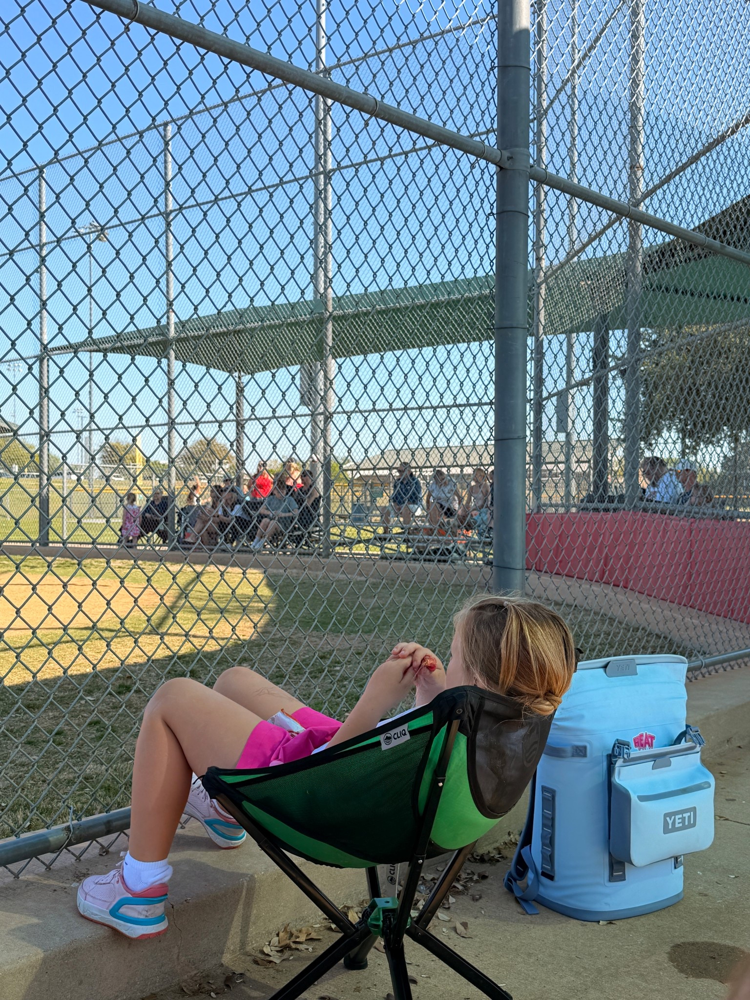 These foldable cliq chairs are so easy to bring to games for the sideline siblings- they fold up into almost the size of a water bottle! So lightweight as well. The yeti soft cooler is also an essential for the long days in the Texas heat! #baseball #sportsmom #sidelinesibling

#LTKmomlife #LTKKids
