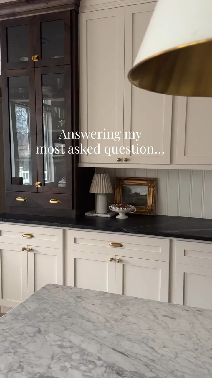 Answering my most asked question that I get about my home! What is my cabinet color? Save this post for later or send to a friend who you think would like this color! It’s the perfect neutral cream! Follow along @ourmountainsidehome_1 for more classic home design and home renovations!  Kitchen, kitchen cabinets, luxury kitchen, Nancy Meyers aesthetic, Ralph Lauren home, warm neutral kitchen, cream cabinets  #kitchen #kitchencabinets #neutralkitchen #nancymeyersaesthetic #luxurykitchen