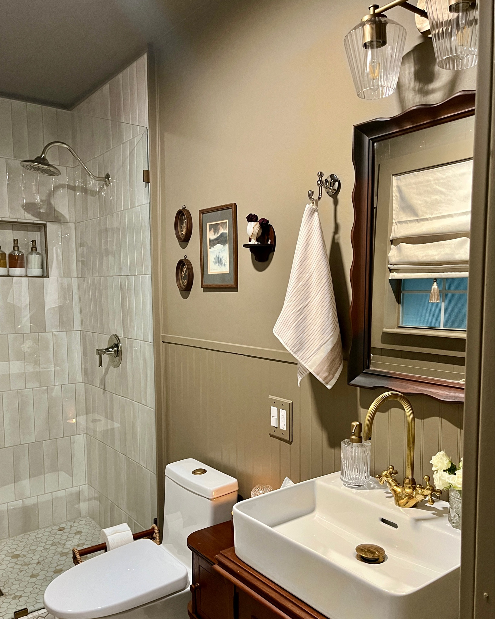 I love this view in my newly renovated hall bath! You can see almost all of the special details, including the tasseled window treatment in the 🪞 

#LTKhome #LTKFind #LTKunder50