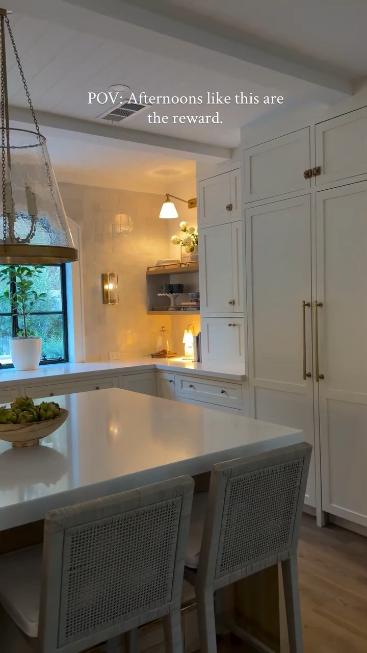 Paint:
kitchen & dining room cabinets 
•	Natural Cream by Benjamin Moore
Satin finish — 
25% tint 

Hood walls & ceiling
•	Chantilly Lace by Benjamin Moore
Satin finish (celing is flat finish)

Tile- Zellige Tile Pure
White 4 x 4

Countertops- Polished
Quartz Slab in Bianca
Calore

For links comment SHOP