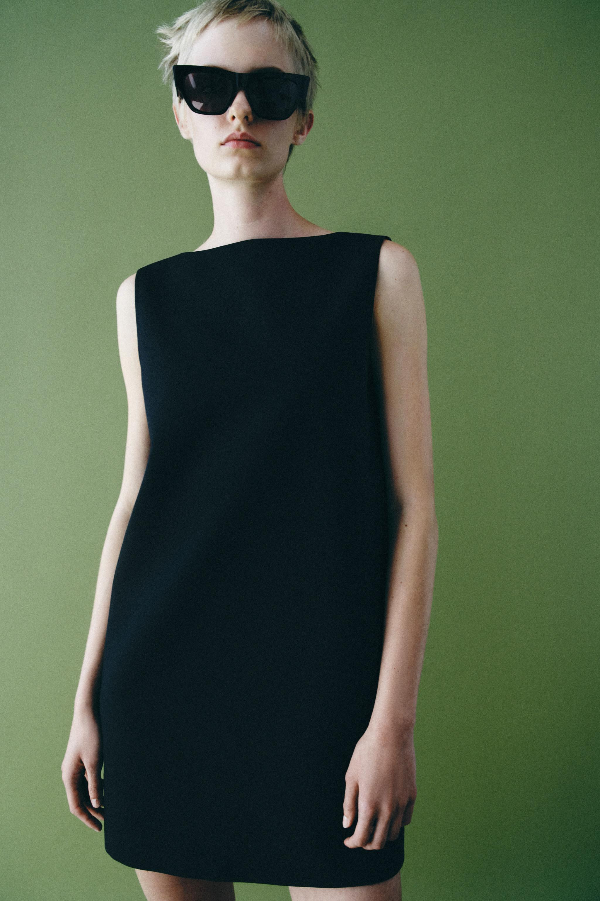 ZARA WOMAN COLLECTIONDress made from a viscose blend yarn. Featuring a round neck and sleeveless ... | Zara UK