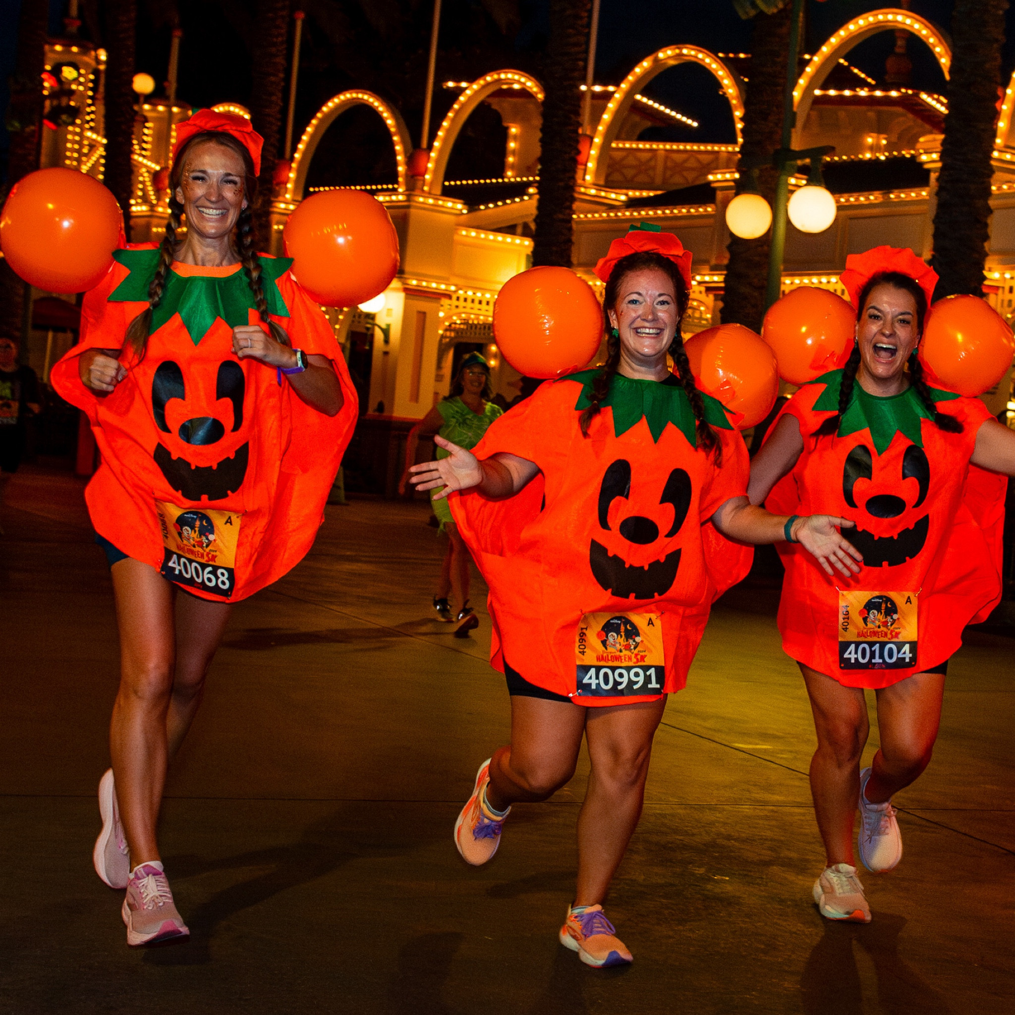 To create our Mickey Pumpkin costumes, we used these premade pumpkin costumes as a base! We then bought orange beach balls and duct tape to attach the ears. Cutting small slits near the shoulders and duct taping the beach balls to sports bra straps was the way to go! We changed the face to make it more Mickey like using my Cricut and black heat transfer vinyl!

#LTKFitness #LTKFindsUnder50 #LTKSeasonal