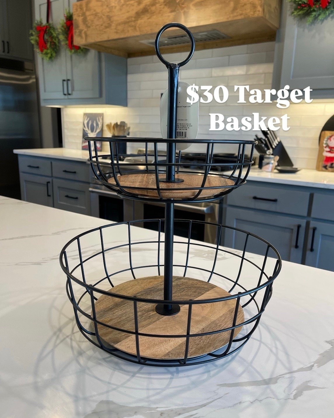 Iron and Mangowood Wire 2 Tier Fruit Basket Black, metal fruit basket, black fruit basket, 2 tier fruit basket, tiered fruit stand, countertop fruit basket, kitchen fruit organizer, black pantry basket, pantry organization basket, Target pantry organization, Target pantry basket, Target kitchen organization, Hearth and Hand kitchen, farmhouse kitchen organization, Target kitchen decor, Target farmhouse kitchen, Target home decor, Target wire organization, wood and wire basket, metal wire basket, rustic kitchen storage, modern farmhouse kitchen decor, neutral kitchen decor, black and wood kitchen decor, countertop organization kitchen, kitchen counter styling, kitchen storage solutions, small kitchen organization, space saving kitchen storage, fruit and vegetable storage, produce basket stand, tiered kitchen organizer, open kitchen storage, everyday kitchen essentials, aesthetic kitchen organization, clean kitchen aesthetic, minimal kitchen decor, warm neutral kitchen, cozy kitchen styling, collected kitchen look, curated kitchen decor, functional home decor, practical kitchen storage, entertaining essentials kitchen, hosting essentials, hosting must haves, serveware display basket, kitchen styling ideas, home organization ideas, affordable kitchen organization, budget friendly home organization, designer look for less home, high end kitchen decor for less, Target kitchen finds, Target home finds, Target new home decor, trendy kitchen organization 2026, Morgan Grace Howe

#LTKSeasonal #LTKdayinmylife #LTKHome