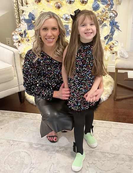 Matching mommy and me, New Year’s, sequence outfits, black leather skirt, sequent, one shoulder top toddler girl, sequent dress

#LTKHoliday #LTKSeasonal #LTKover40