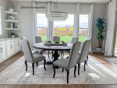 ModernFarmhouseGlam dining room and kitchen furniture. Neutral area rug, crystal chandelier, 120 inch white curtains, dining room chairs, farmhouse round table. Area rugs, living room, family room, home Decor. 


#LTKHome