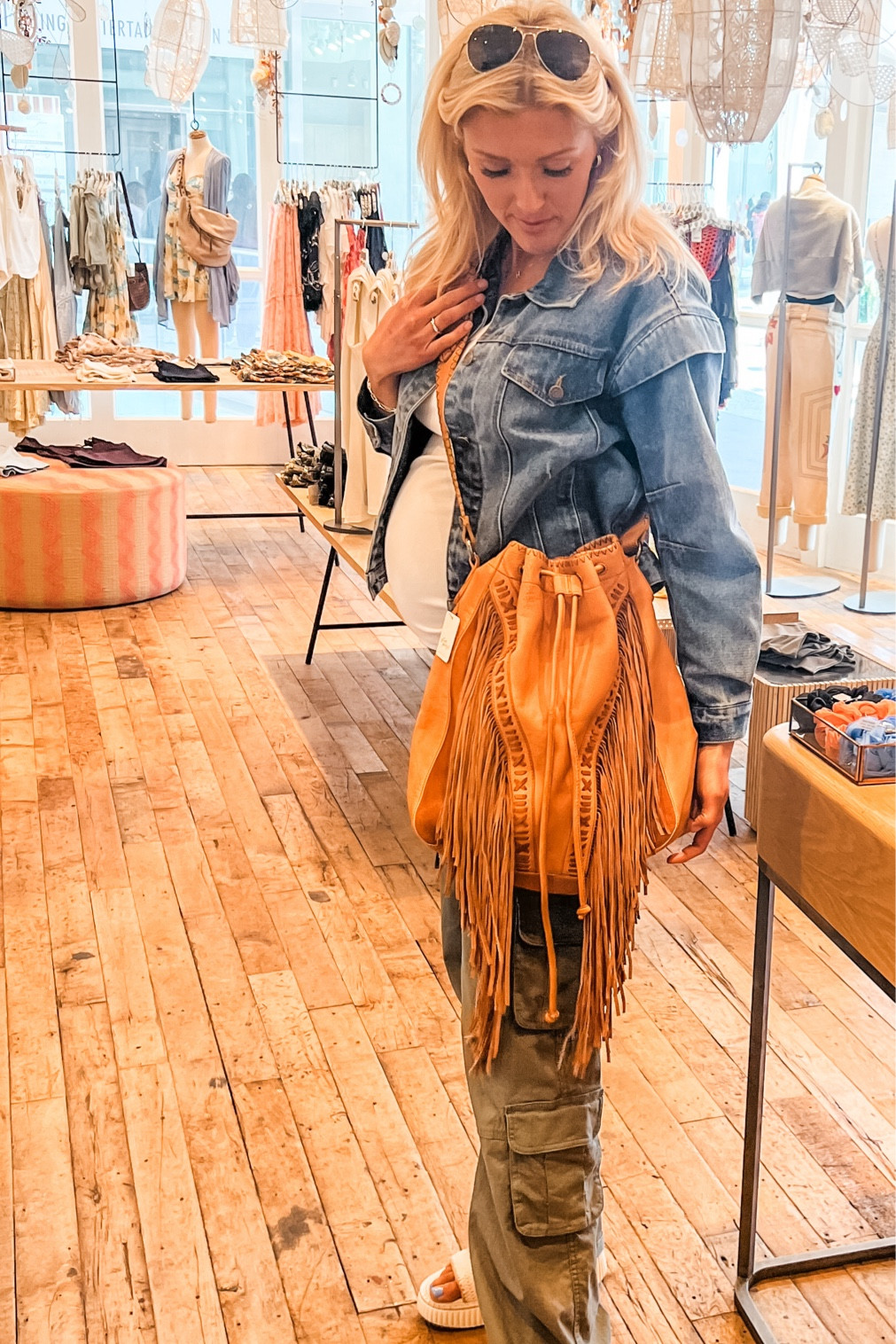 Im a sucker for a good fringe bag and Free People has overdone it with this beautiful item! This tote bag has many compartments and I loved the cinched details that can change the shape of the bag. The color is gorgeous and the perfect neutral to add to your collection. 

#LTKBump #LTKItBag #LTKStyleTip