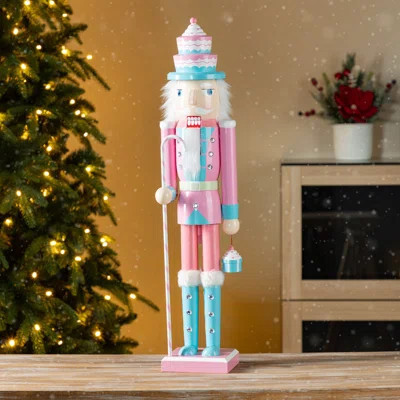 24"H Wooden Christmas Pink Cake Nutcracker | Wayfair North America