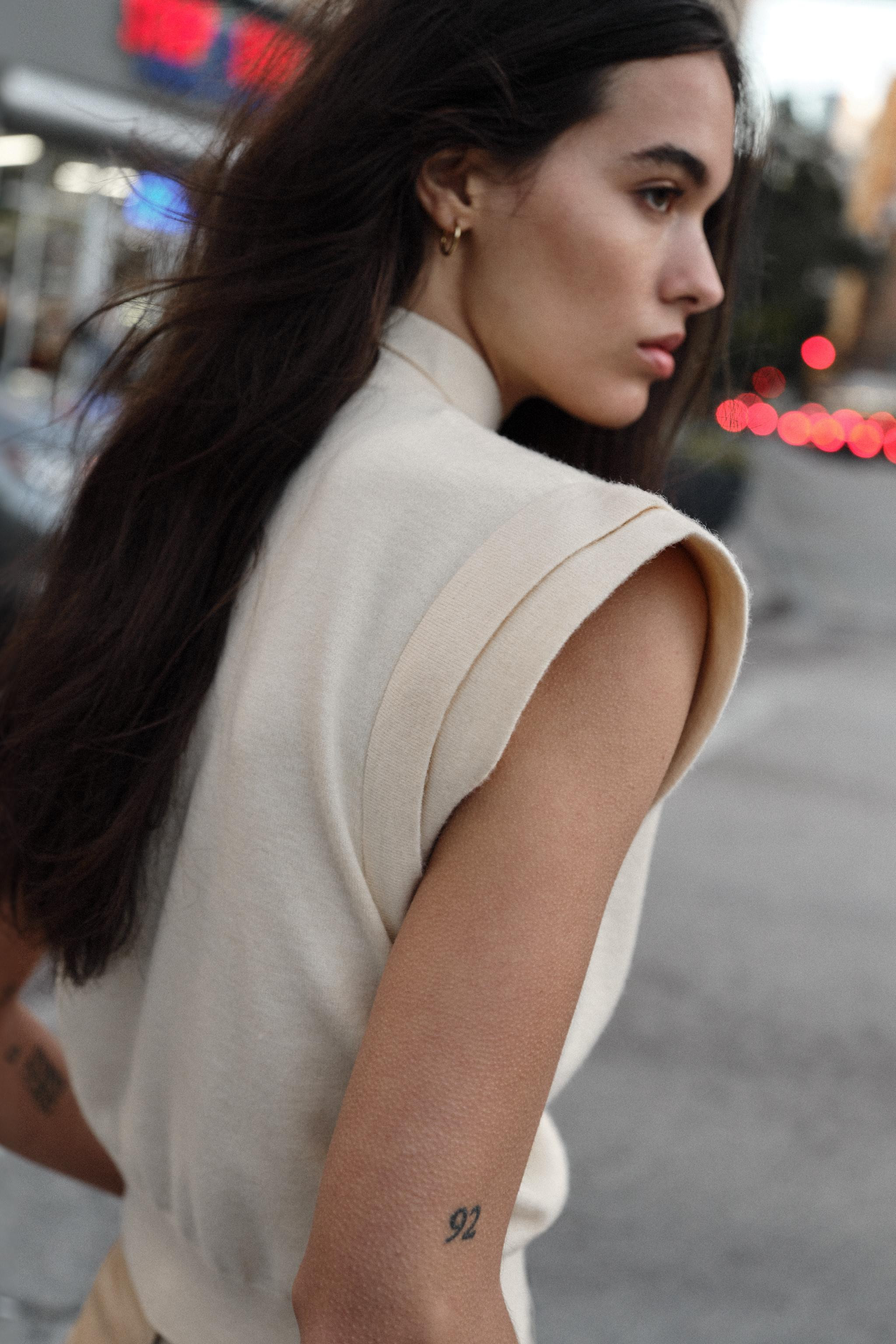 Plain knit top with a high neck and sleeveless design with padded shoulders. | Zara UK