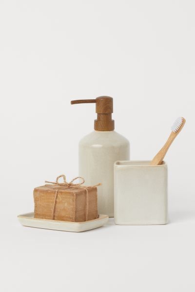 Soap dispenser in glazed stoneware with a plastic pump. Diameter 3 1/4 in. Height excluding pump ... | H&M (US)