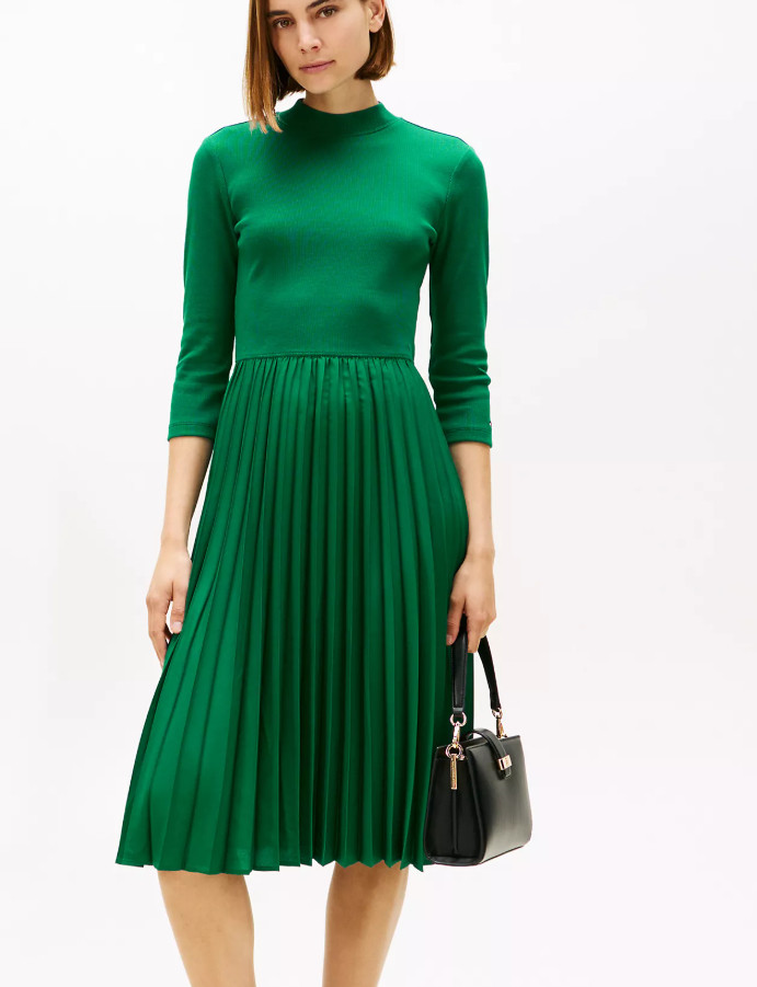 This Tommy Hilfiger pleated midi dress brings timeless elegance to your wardrobe. Designed with a soft jersey bodice and a flowing pleated skirt, it combines comfort and sophistication in one refined silhouette. The stretchy waist enhances your shape while allowing ease of movement — perfect for daytime events, work meetings, or dinner nights. Style it with black flats and a structured bag for a classic look that never goes out of style. Tap to view this stunning green dress and elevate your everyday elegance.

#tommyhilfiger #midiDress #fallfashion #elegantstyle 

 

#LTKHoliday #LTKPetite #LTKStyleTip