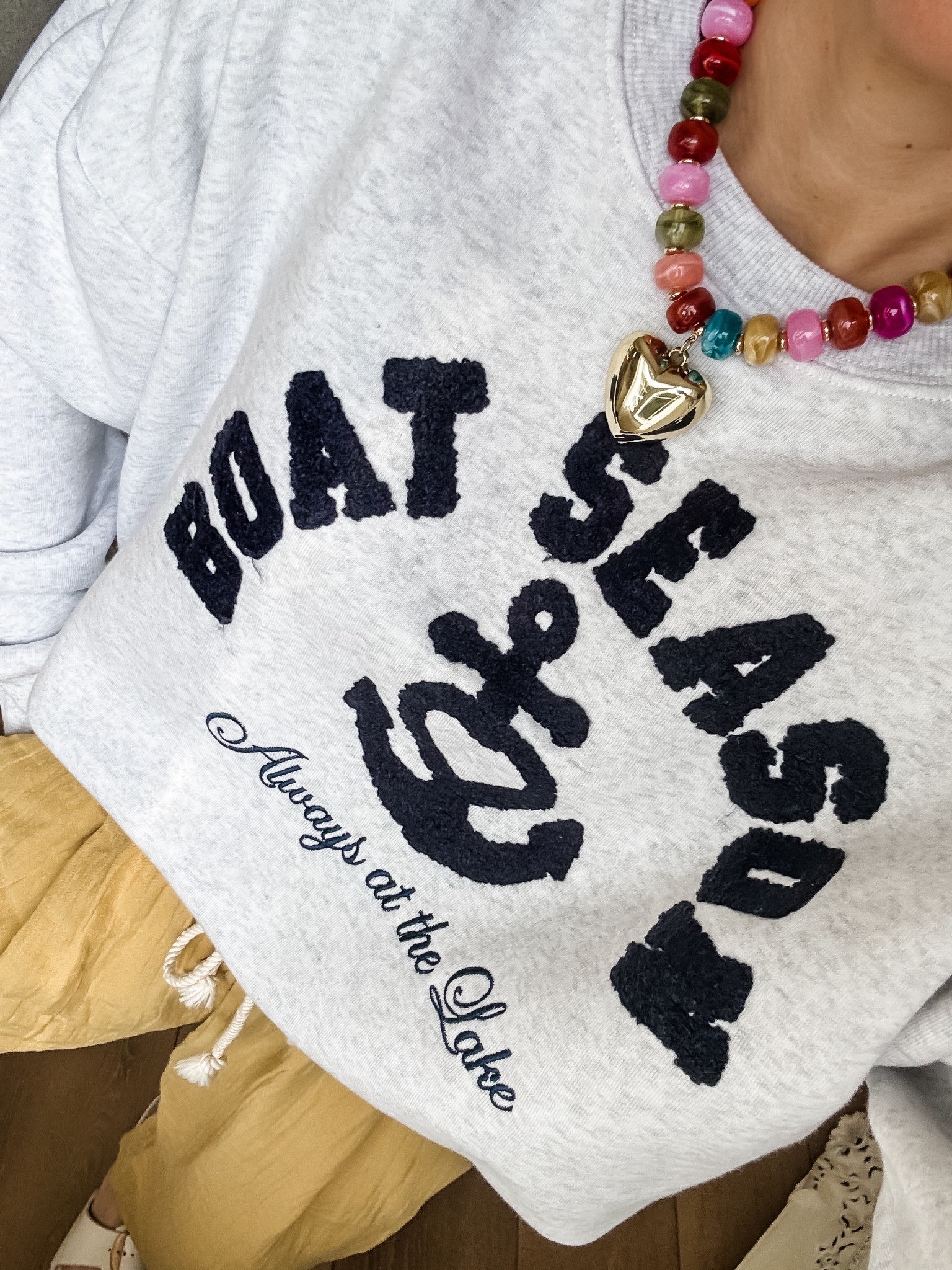 Small sweatshirt. Heart necklace.

#LTKOver40 #LTKSaleAlert