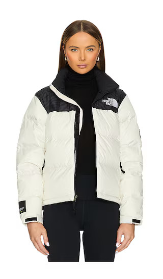 1996 Retro Nuptse Jacket in White Dune | Revolve Clothing (Global)