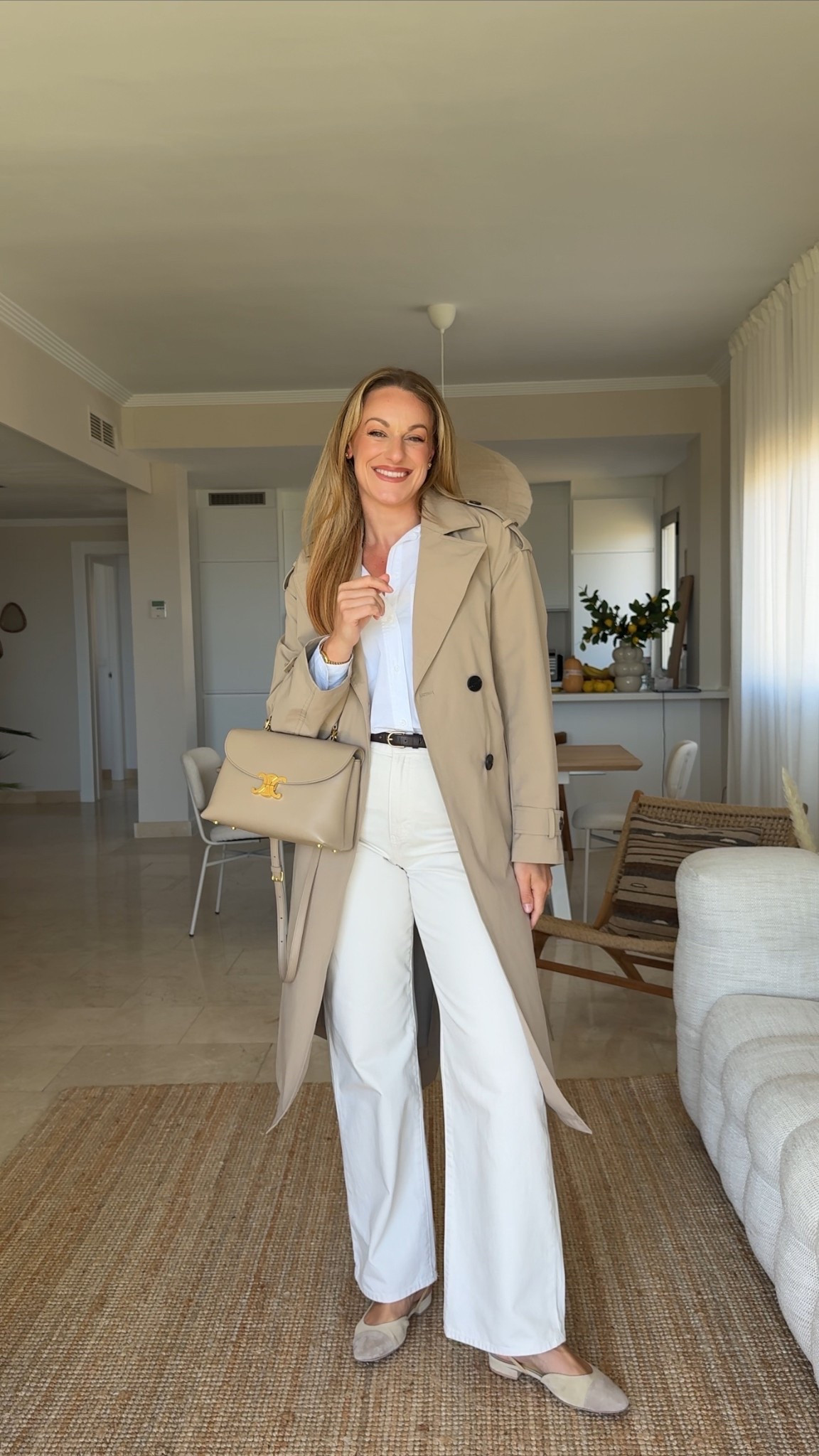 Spring outfit of the day - day 14/30 trenchcoat, waterproof, off-white wide leg jeans, white shirt, brown belt, Celine ￼handbag, CHANEL Ballet suede flats 
