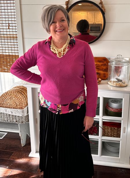 Pink blouse with pink sweater and black pleated midi skirt 
#pink #pinkmukticoloredblouse #over50fashion 

#LTKover40 #LTKbeauty #LTKworkwear