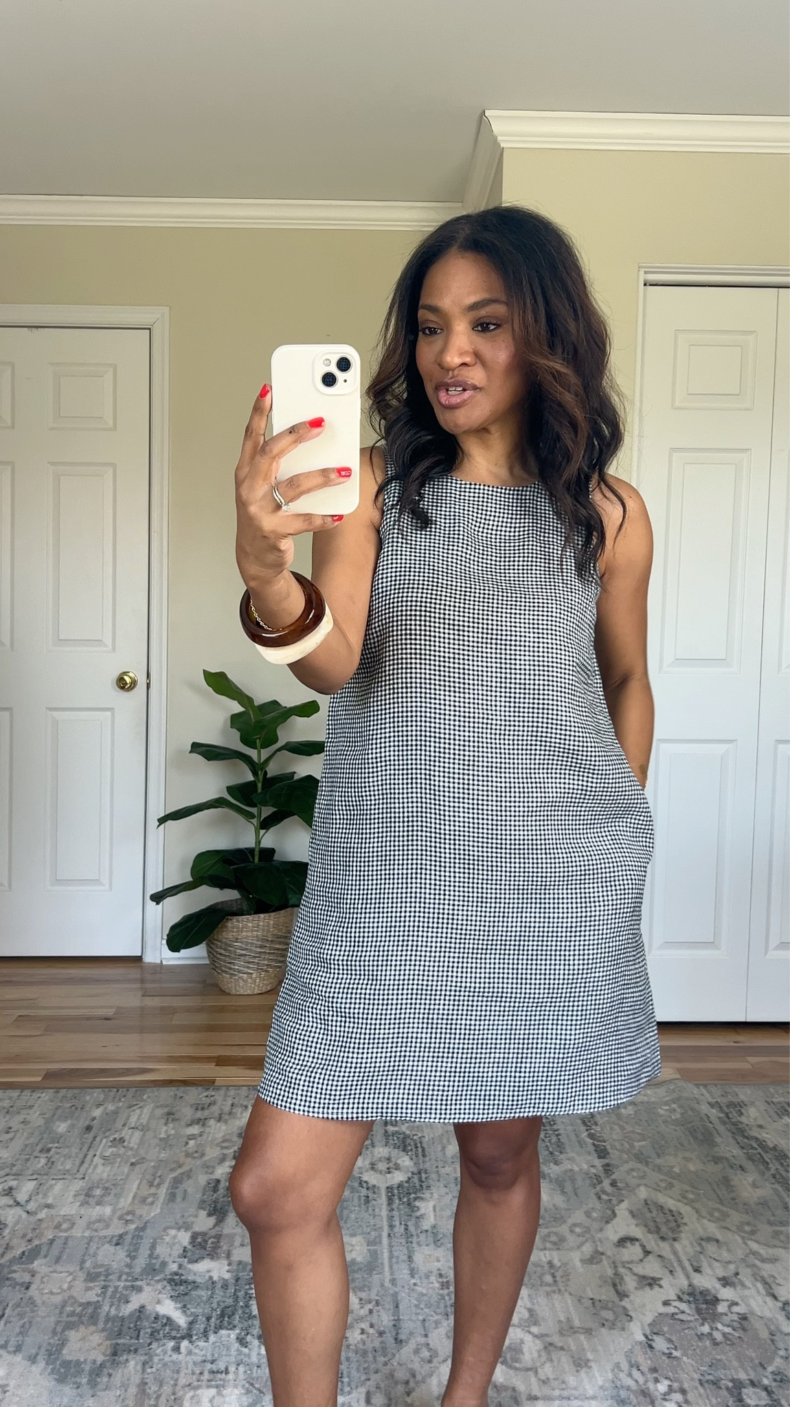 Three easy ways to style this gorgeous gingham print linen dress from Quince! Made from 100% 
European linen, it’s lined and the perfect length to wear to the office. I am wearing a size XS, so 
I sized down one from my normal size. I am wearing a size small in the Mongolian Cashmere 
sweater which is lightweight and perfect for Spring. And my navy linen button down is a size 
small. @Quince #quincepartner

 #ltkover40 #ltkworkwear

