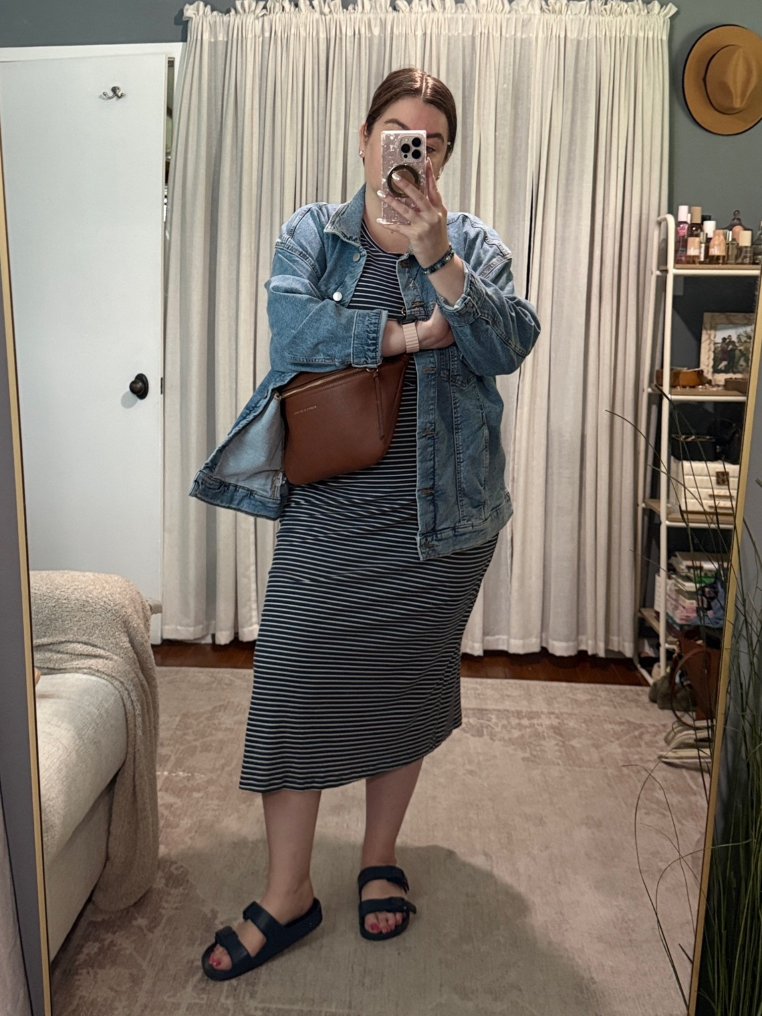 Weekend outfit details 🤍

This striped midi dress has quickly become a favorite in my closet. It’s incredibly comfortable, can easily be dressed up or down, and the built-in bra is a huge bonus.

I layered it with a denim jacket for a casual weekend look and finished it off with simple accessories and flat slides.

Pro tip for my thick-thigh gals: In addition to an anti-chafing stick, I always wear a lightweight pair of biker shorts underneath dresses for extra comfort. My favorites are from Old Navy.

#LTKootd #LTKMidsize #LTKTravel