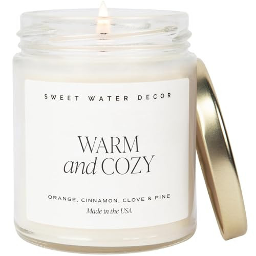 Sweet Water Decor Warm and Cozy Candle - Orange Peel, Cinnamon, Ginger and Clove Soy Winter Scented Candles for Home - 9oz Clear Jar + Gold Lid, 40+ Hour Burn Time, Made in The USA | Amazon (US)