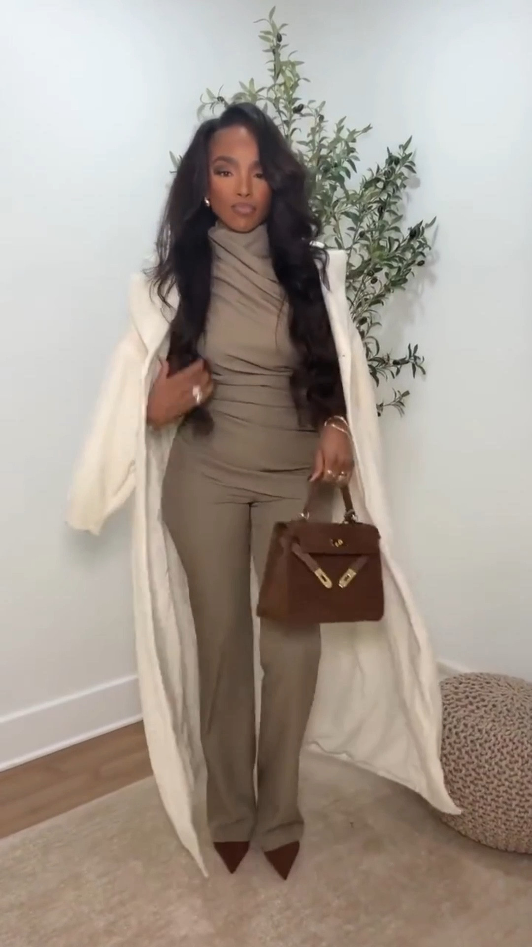Soft, sculpted neutrals — this draped taupe set paired with a creamy long coat creates an elevated winter monochrome moment that feels luxe without trying too hard. Clean lines, fluid drape, and a polished silhouette that looks expensive and effortless.

Perfect for date nights, elevated dinners, and winter events.

📏 Sizing:
Coat — Small
Set — Small
Pants — 27 Long
Heels — 7.5

📏 Measurements:
5’4” • 138 lbs • 34D • 27” waist • 40” hips

Monochrome winter outfit, taupe neutral set styling, chic long coat looks, elevated minimal fashion inspiration, soft winter neutrals, polished cold-weather outfits.

✨ Everything linked below for easy shopping

Follow me on Instagram and YouTube @kirasfashionfinds

#LTKgrwm #LTKootd #LTKHoliday