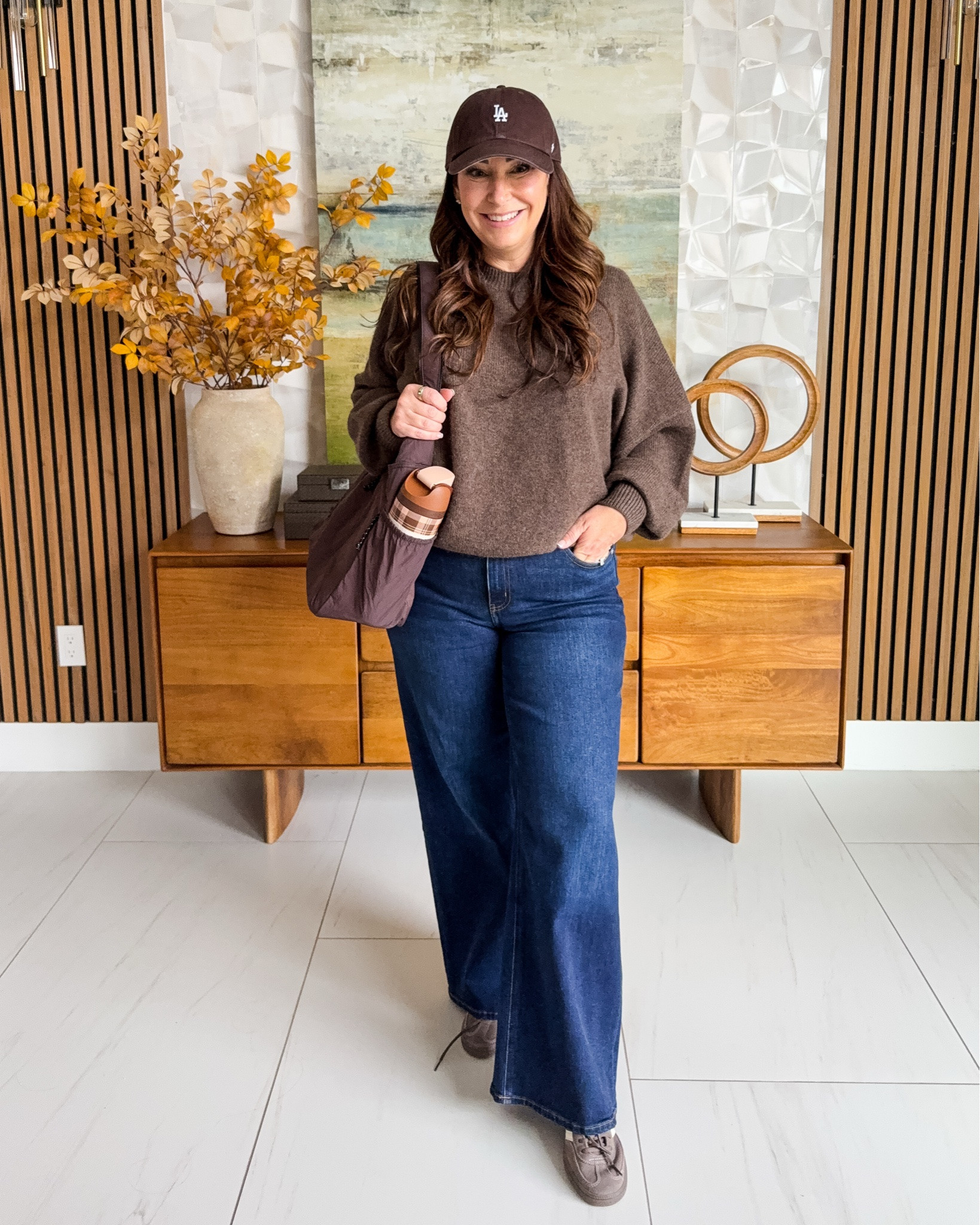 Cozy fall basics done right 🍂 This Quince sweater + wide leg jeans combo is easy, comfortable and perfect for everyday with sneakers and a baseball cap. | Wearing Sweater tts, L | Jeans tts, 31

#LTKSeasonal #LTKOver40 #LTKMidsize