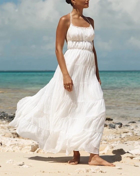 Romanticize your tropical getaway with an angelic white backless maxi dress. This tiered maxi dress is ideal for romantic getaways, bridal showers, and summer escapes. Under $80. Style the look with an adorable woven bag and platform heels.

Keywords: White maxi dress, white tiered dress, tiered maxi dress, resort outfits 2026, resort outfits women, backless maxi dress, day dates, beach vacation outfits, summer beach outfits, summer vacation outfits, tropical destinations dresses, bridal shower, beach wedding dress, beach bridal shower, engagement party, strapless maxi dress, white mini dress, white midi dress

#LTKTravel #LTKgrwm #LTKWedding