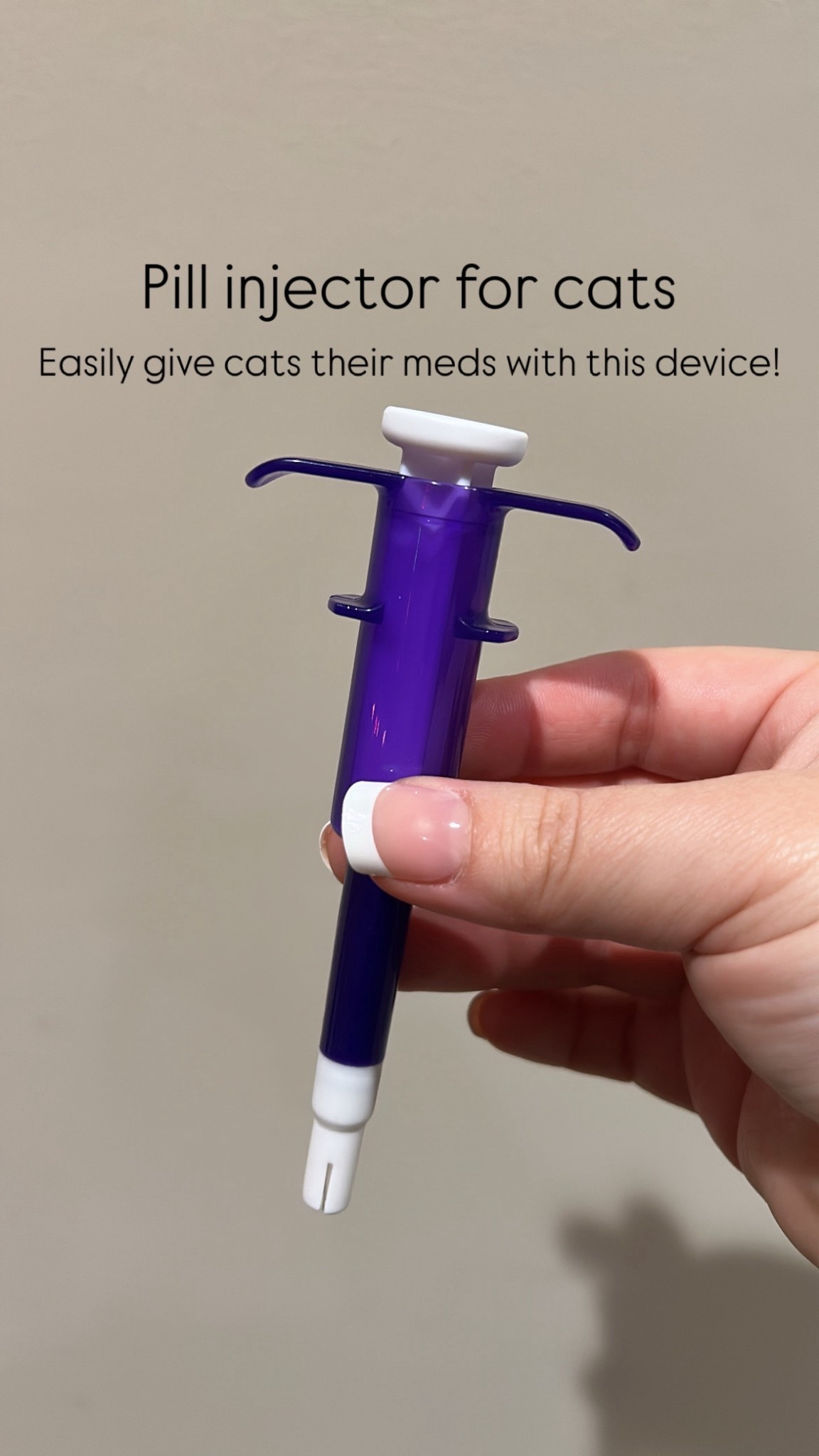 Simply place the pill in the bottom of the device where it will be held firmly by the device. Pull back the white top and insert into the cat’s mouth, around the back of the mouth/throat. It’s easiest if you enter the cat’s mouth from the side. Then simply push the white top all the way down! This will help guide the pill down the cat’s throat! #LTKpets #LTKpetcare #LTKcat #LTKcats 

#LTKHome