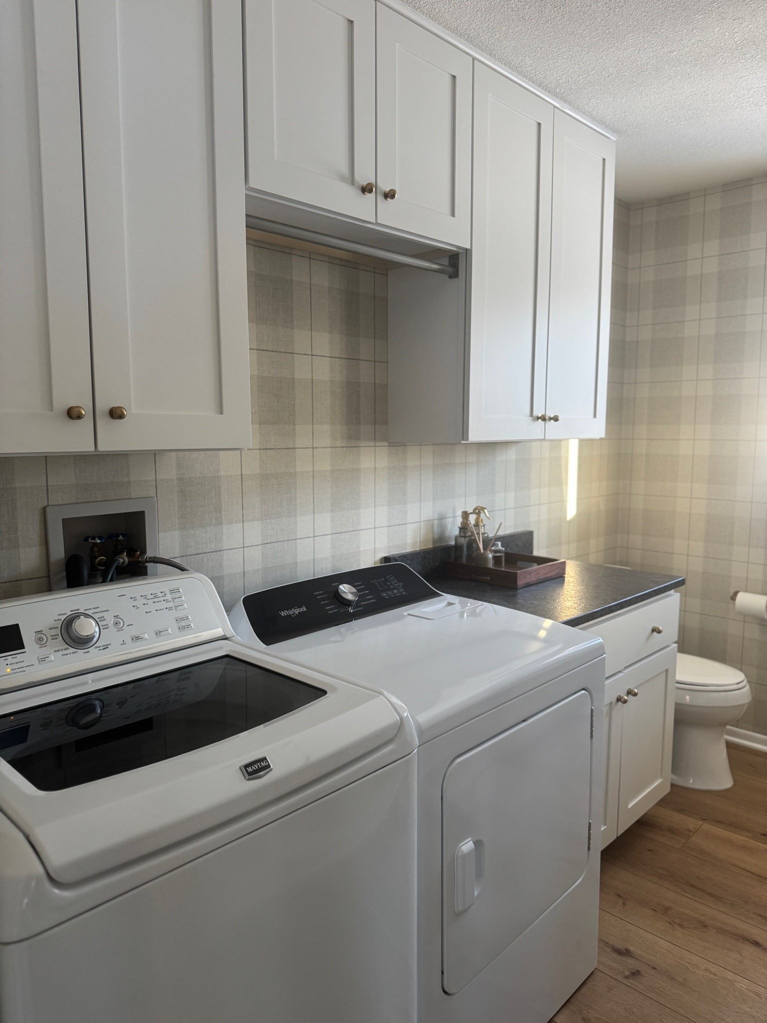 Laundry room update 🤍 new hardware & installed this gorgeous peel and stick wallpaper! We love it!

#LTKHome