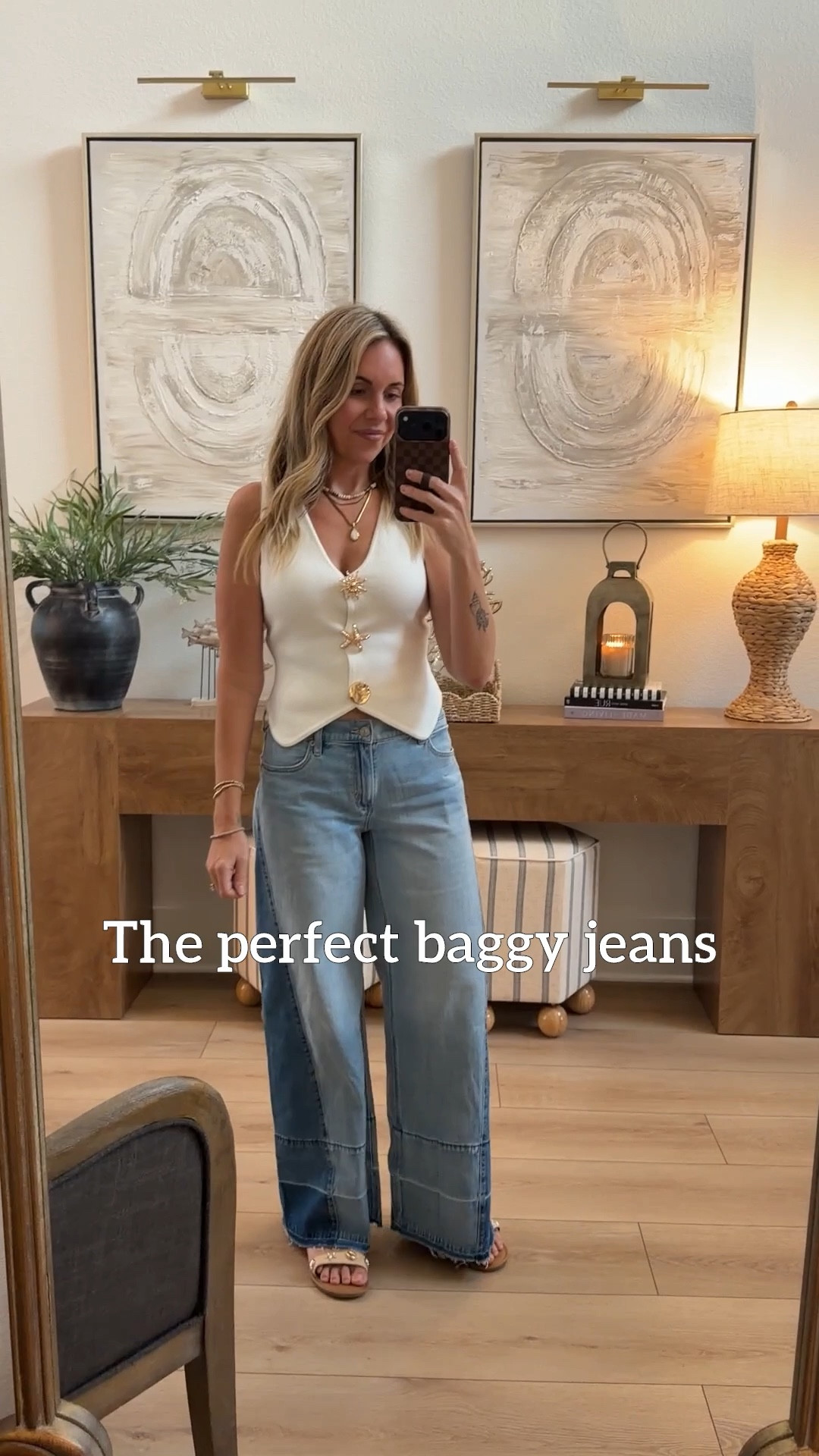 These baggy jeans are the perfect amount of baggy for me! They’re a midrise and hit me right below my belly button. I sized down one size to a 2. I’m mostly a 4 in jeans and shorts about 138lbs currently. These AE jeans ran pretty lose. I also think the will get loser as I wear them because all my AE jeans do that. They are light and have some stretch and at 5’7 I think I’d prefer a long length but settled for regular. This vest was from Altar’d state so I can’t link it. 🩵 #americaneagle #ae #baggyjeans #momfit 

#LTKFestival #LTKootd #LTKmomlife