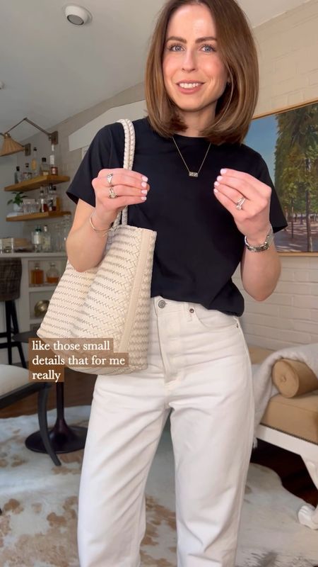 A great basic black tshirt and simple outfit idea
Sold out nyc
White jeans agolde 
Silver metallic slide sandals
Ivory Woven leather tote bag madewell 

#LTKitbag #LTKshoecrush #LTKfindsunder100