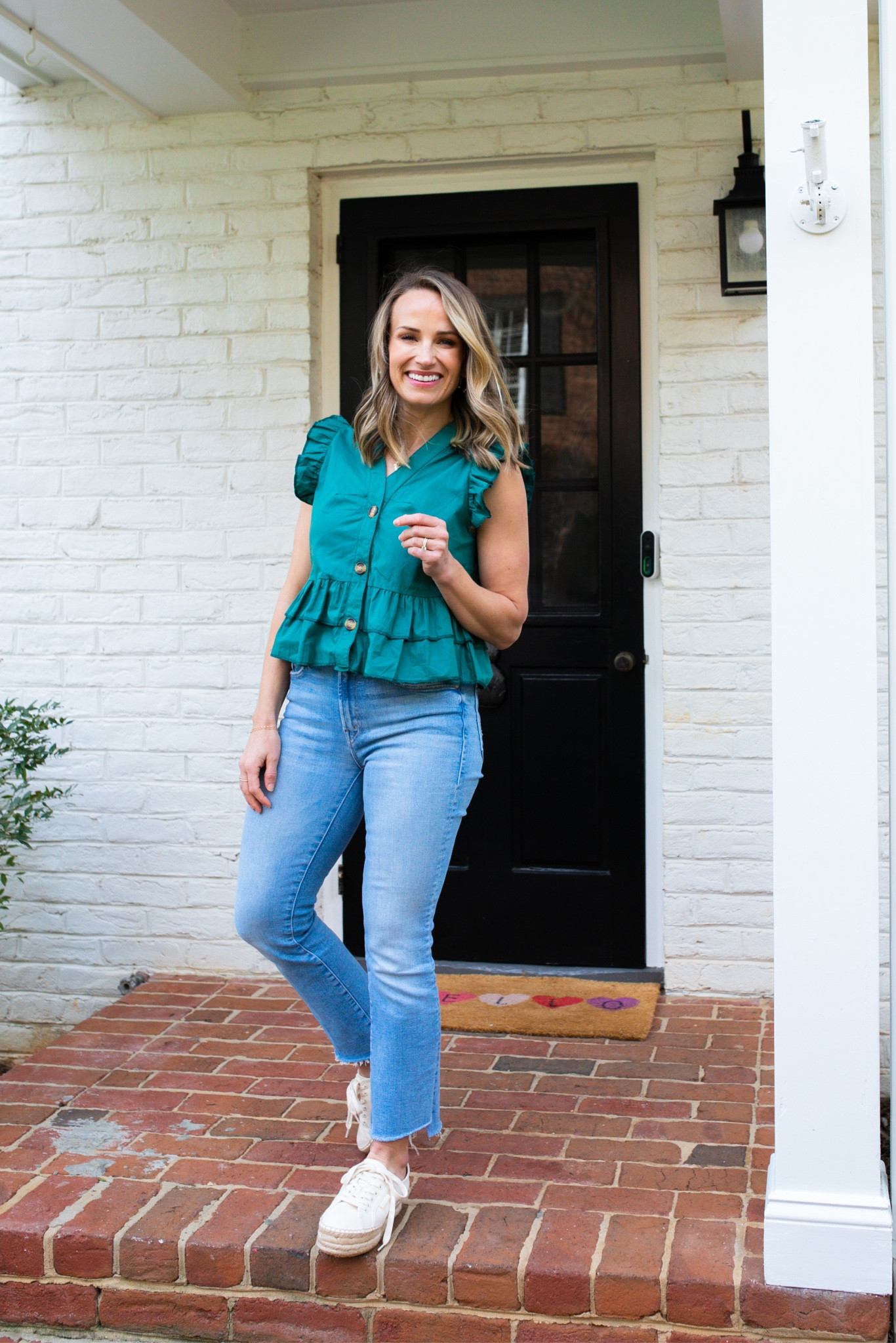 Wearing a size small in this sleeveless ruffle button up Amazon blouse. Only $14!

#LTKstyletip#LTKSeasonal#LTKunder50