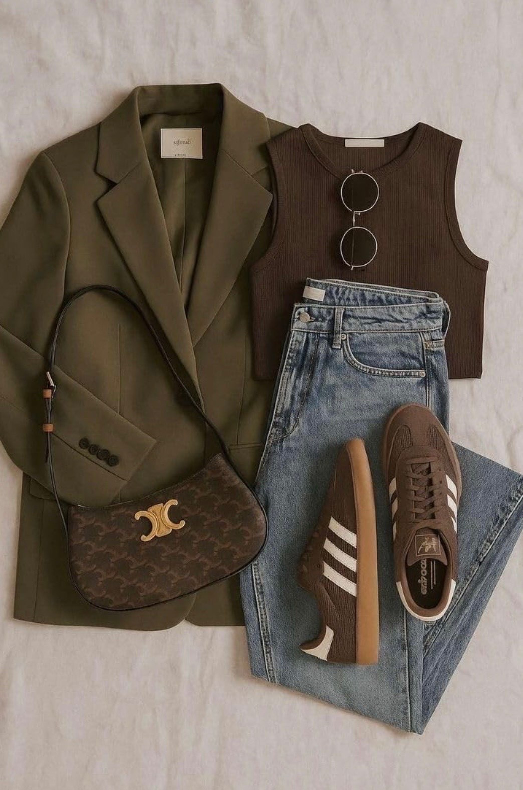 Neutral luxe with a sporty twist 🤎
This outfit is the definition of effortless style—structured blazer, classic denim, and the cutest brown sneakers to pull it all together. It’s the perfect everyday look you can dress up or down all season long.

Everything is linked in my LTK and Amazon storefront so you can shop the full look or grab similar pieces at different price points.

#LTKStyle #AmazonFinds #NeutralOutfit #EverydayStyle #ViralFashion