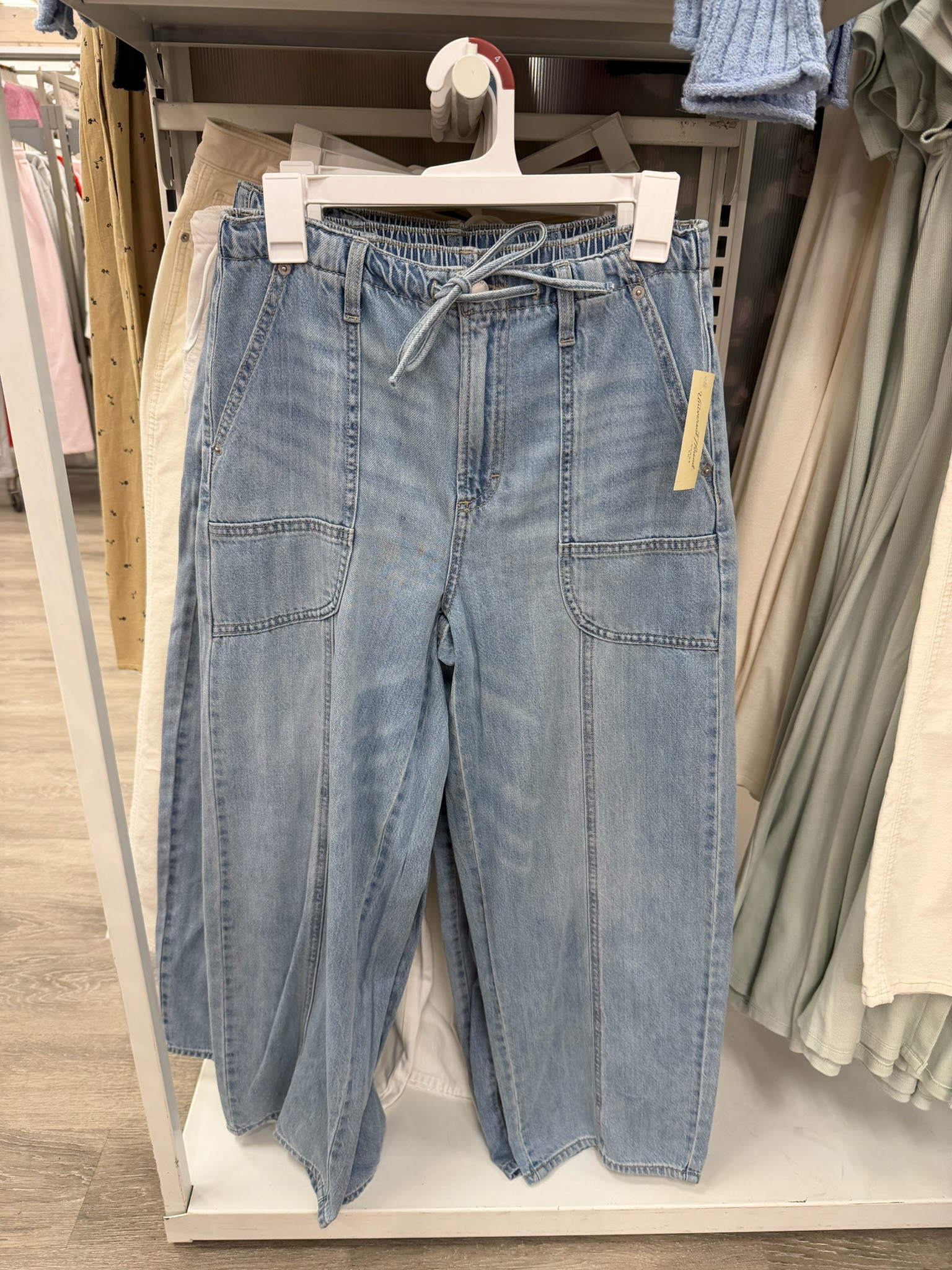 These drawstring utility jeans from target are SO good. Lightweight, comfy, and actually flattering for everyday wear. 
spring outfits 2026, spring outfits women, casual outfits, everyday outfits, wide leg jeans, vacation outfits beach, target finds, comfy outfits, effortless style, affordable fashion, denim trends, street style 

 #LTKgrwm #LTKootd #LTKWorkwear