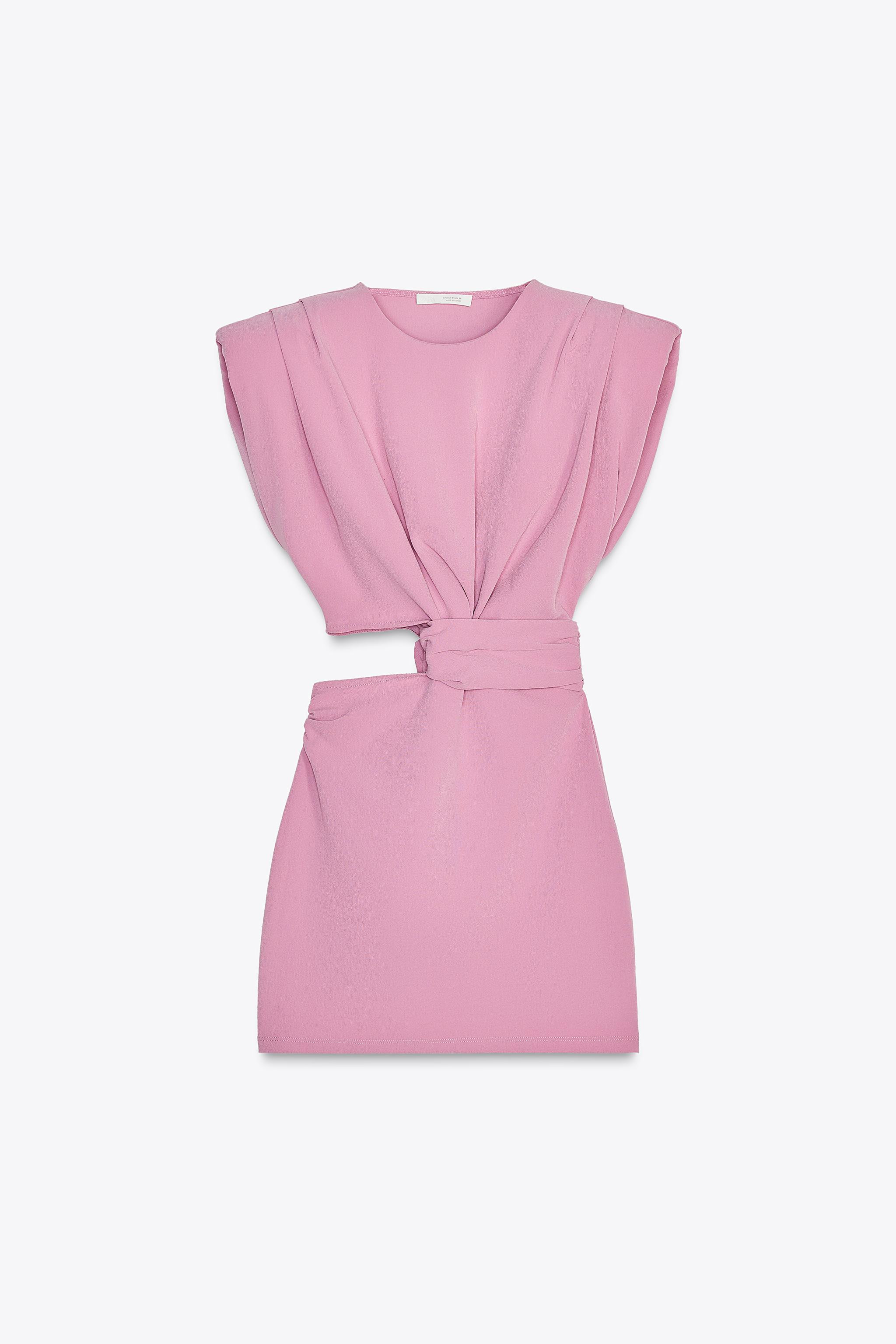 Short dress with round neckline and sleeveless armholes with shoulder pads. Cutout detail and dra... | Zara US