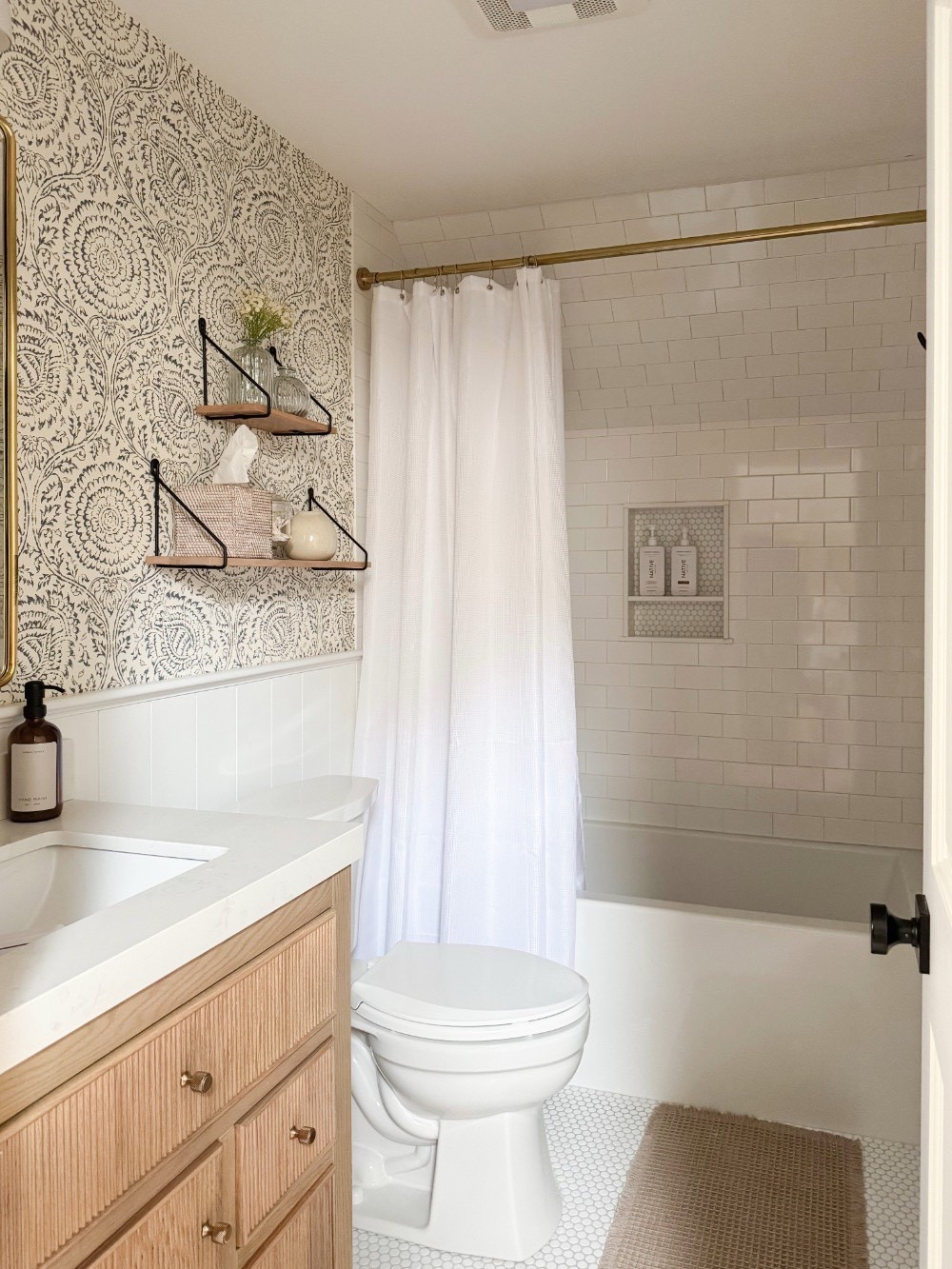 Simple bathroom touches that make a big impact ✨ I love the wallpaper in here, and it’s one of your favorites too! It has such a fun print while still remaining neutral. I’m also linking some bath accessories in case you’re in need of a refresh! 

#LTKSaleAlert #LTKHome