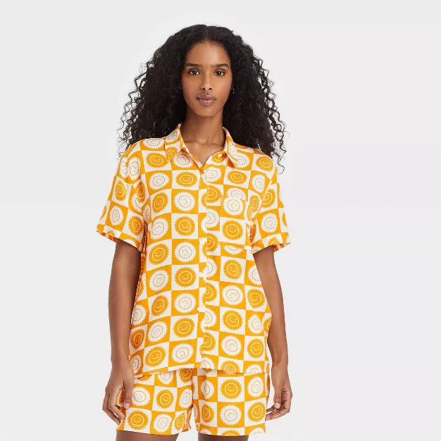 Women's SmileyWorld Souvenir Short Sleeve Button-Down Graphic T-Shirt - Yellow | Target