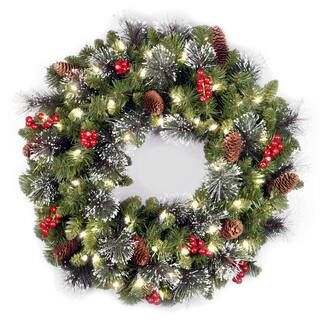 24" Crestwood® Spruce Wreath with Silver Bristle, Pine Cones, Red Berries & Glitter with Warm Wh... | Michaels Stores
