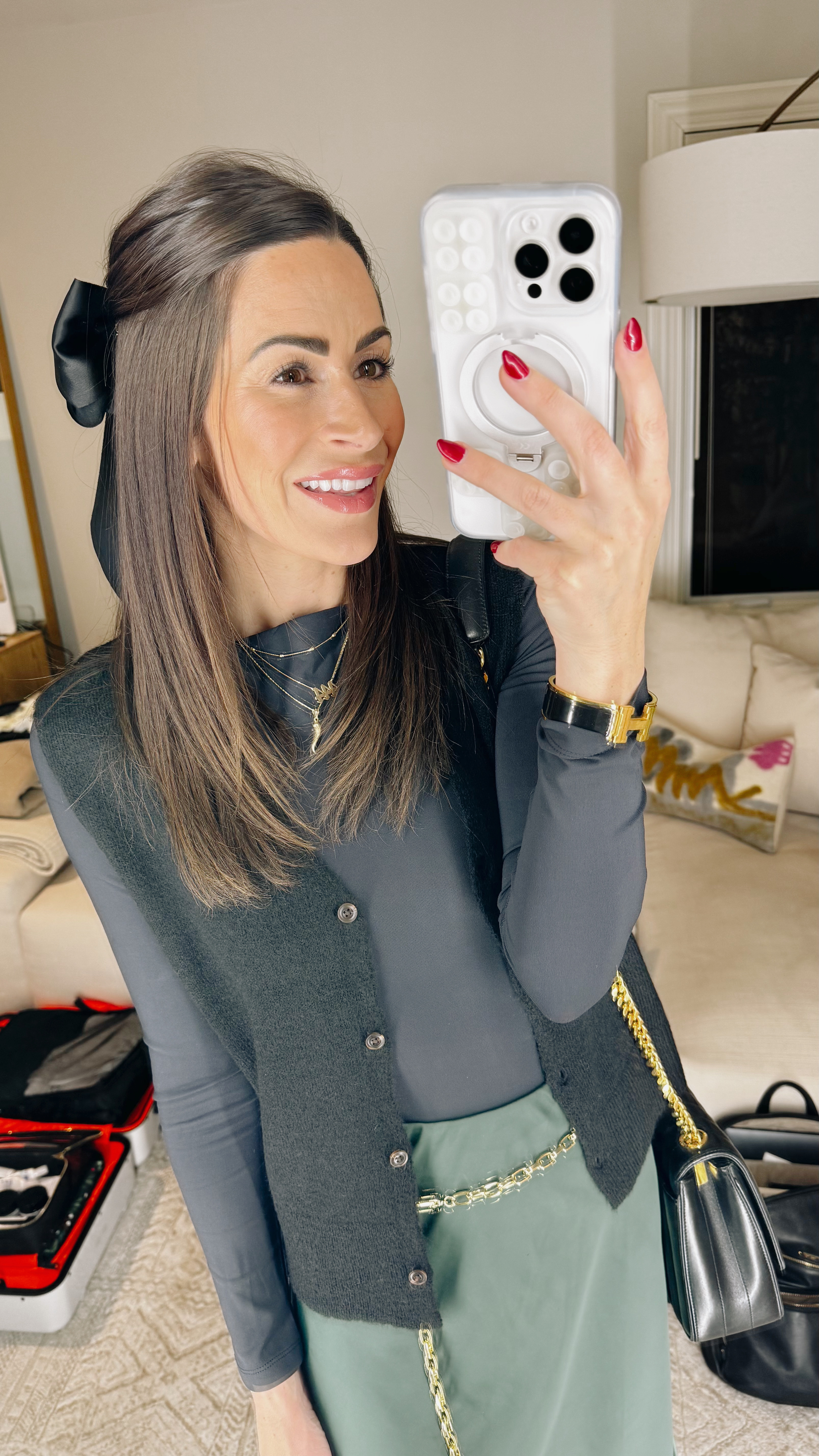 Holiday vibes with a pop of luxe ✨ Loving this combo of a satin midi skirt, cozy knit vest, and sleek over-the-knee boots. Tied it all together with gold accessories and my favorite YSL bag for a polished look that’s perfect for holiday parties or festive dinners.

🖤 Vest and Bodysuit: xxs and s
💚 Skirt: xs
👢 Boots: 7.5

#HolidayStyle #FestiveFashion #OOTD #ChicAndCozy #LTKHoliday 

 

#LTKSeasonal #LTKFindsUnder100 #LTKStyleTip