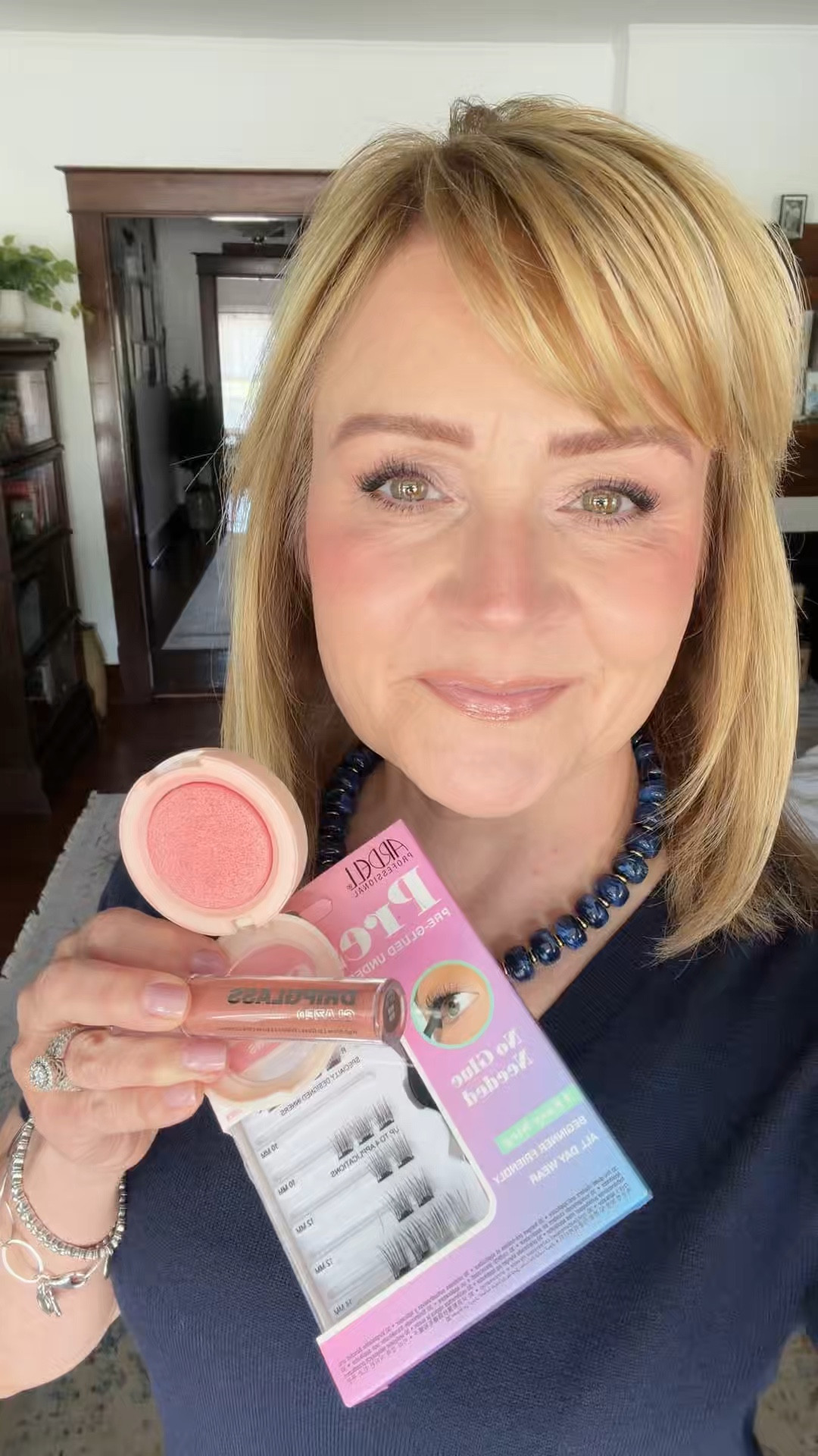 So many thing I love about this.  The blush, new gloss and the lashes.  

#LTKOver40 #LTKBeauty