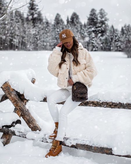 Casual winter outfit / ski season outfit
Similar Sherpa jacket
Nordstrom white jeans
H&M white hoodie 
Ny Yankees cap
Timberland boots / snow boots 

#LTKSeasonal #LTKfindsunder100 #LTKshoecrush