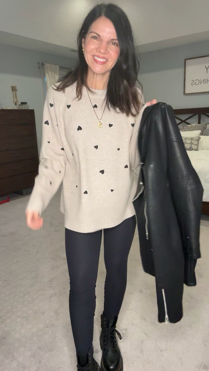 I love this split hem heart sweater and can we all agree that a black faux leather jacket just adds some extra edge to an outfit?! Mine is older but I linked similar options! 🖤

#LTKStyleTip #LTKOver40 #LTKFindsUnder50