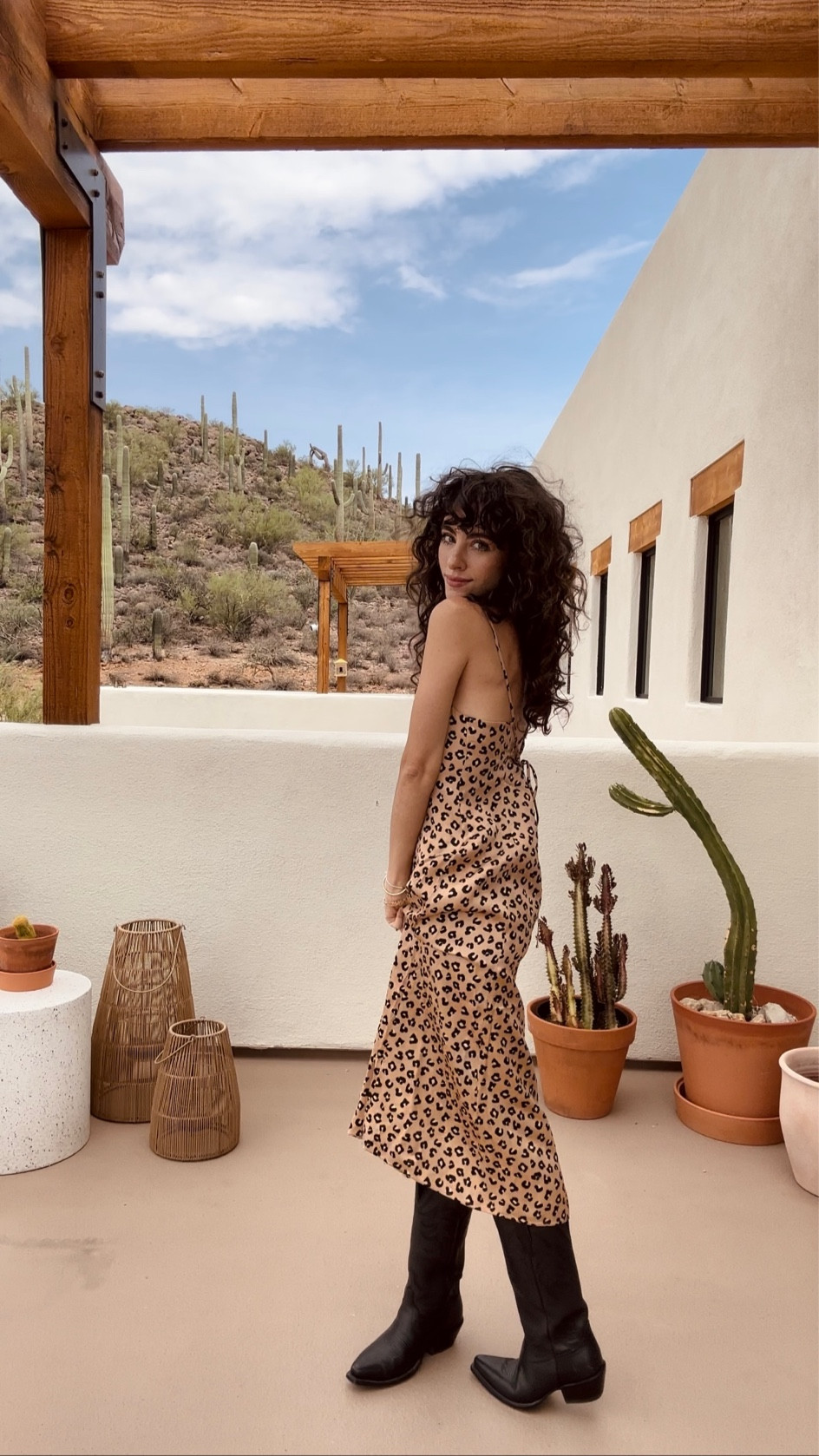 Leopard Sezane dress and cowboy boots - silk sundress and Tecovas black western boots - country concert outfit ideas 

#LTKunder100 #LTKSeasonal #LTKstyletip