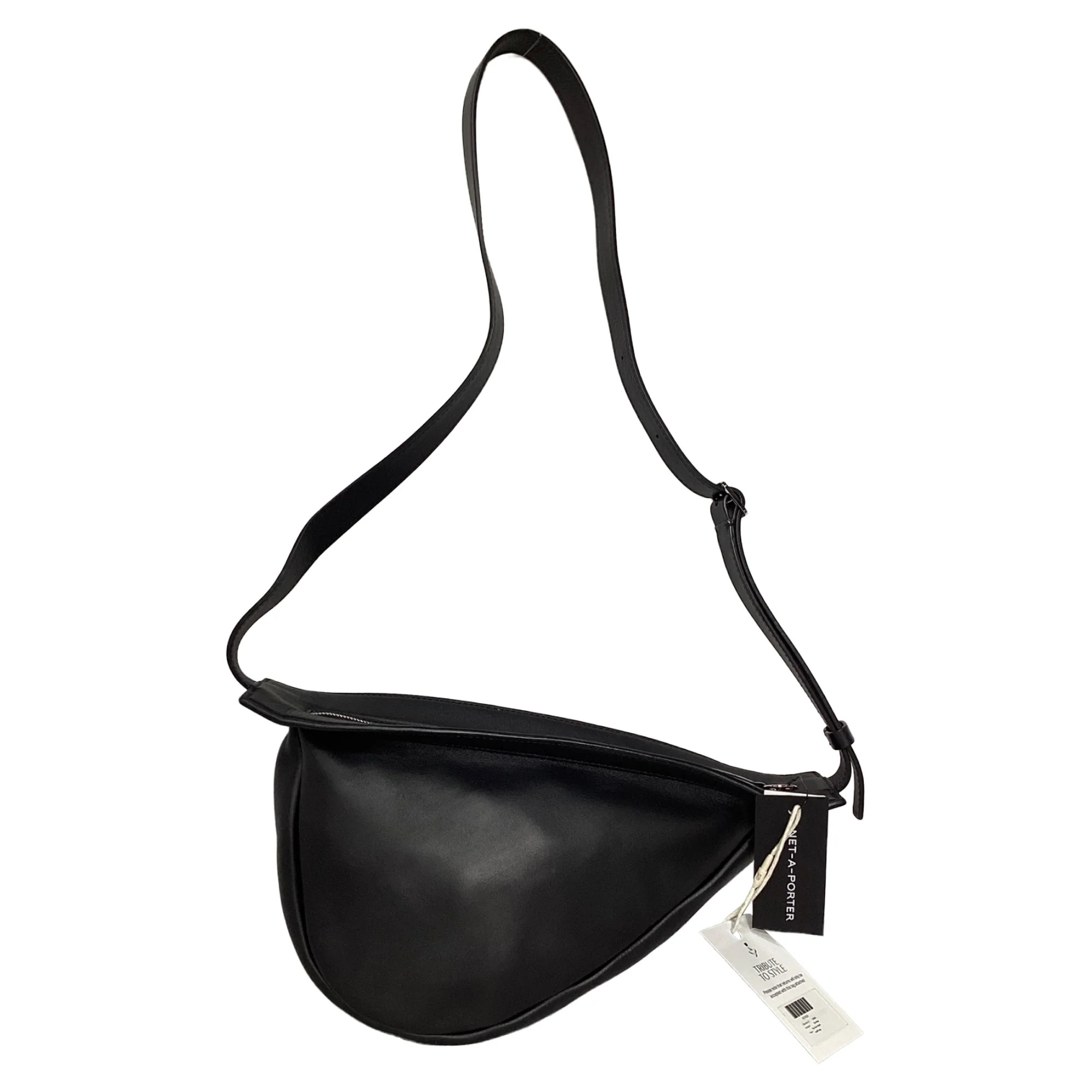The Row Slouchy Banana Shoulder Bag in Black Leather | Shop Simon