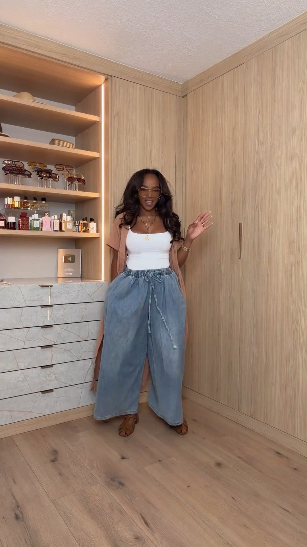 Hi babes!

Okay this outfit is EVERYTHING — this layering moment instantly elevates a simple tank and denim look and gives that effortless, put-together vibe we all want.

These wide leg jeans are a top seller and consistently go viral — they are a high sell-out risk and always restock + sell out again because of how flattering they are.

This lightweight layer is perfect for throwing on over basics and makes the whole outfit feel styled without trying too hard.

Where to wear this:
• Casual days out  
• Travel outfits  
• Brunch  
• Everyday errands  

Everything is linked below.

xx Kira | @kirasfashionfinds  

Measurements: 5’4” | 138 lbs | 34D | 27” waist | 40” hips

Comment SHOP below to receive a DM with the link to this post on my LTK ⬇ https://liketk.it/6aYny ltkvideo primeday2022 ltkxprimeday ltkxprime

https://liketk.it/6aYny
