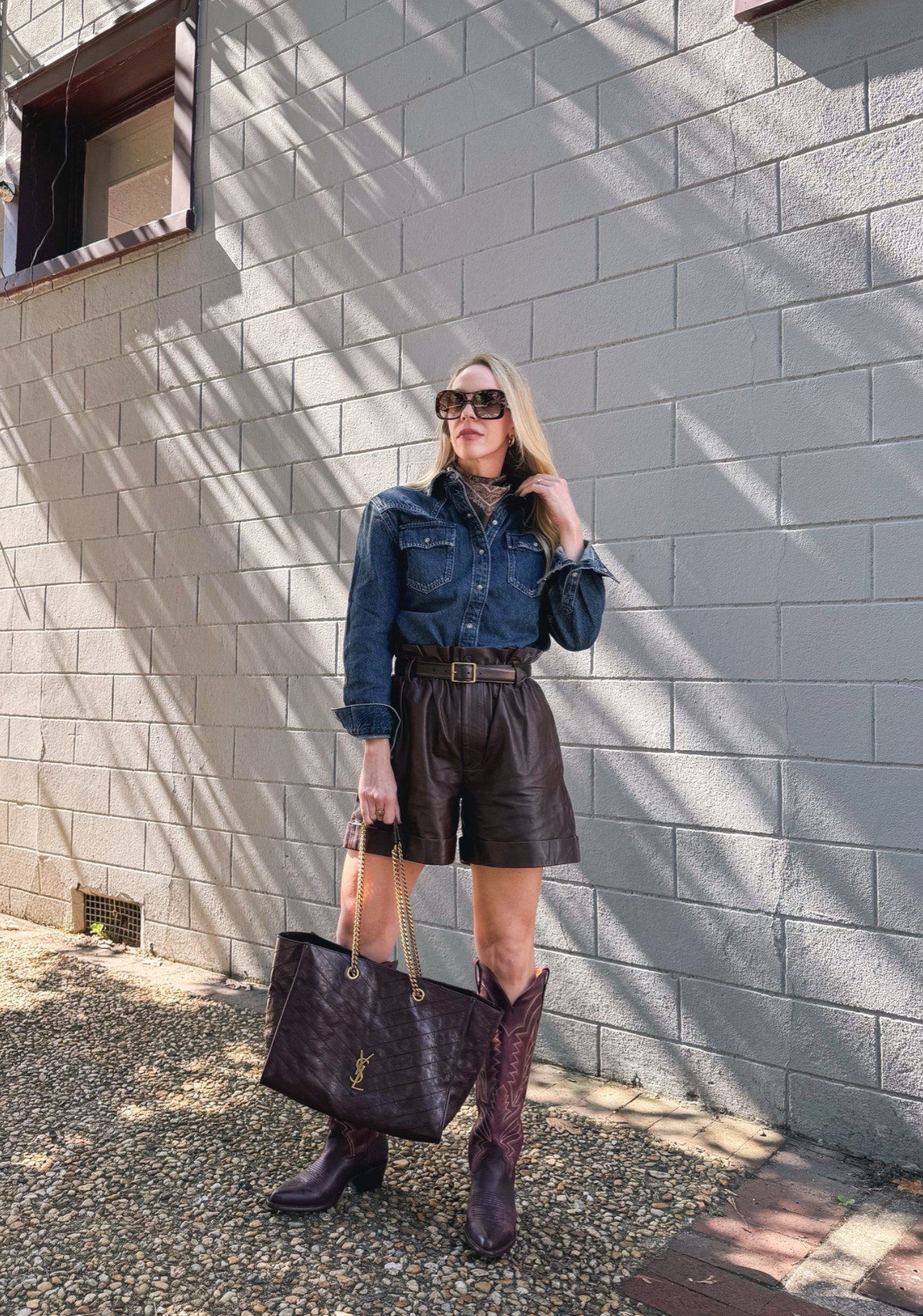 Fall western outfit, denim shirt, paisley silk scarf, brown leather shorts, @Tecovas burgundy cowboy boots, fall outfits over 40

#LTKSeasonal #LTKOver40 #LTKSaleAlert