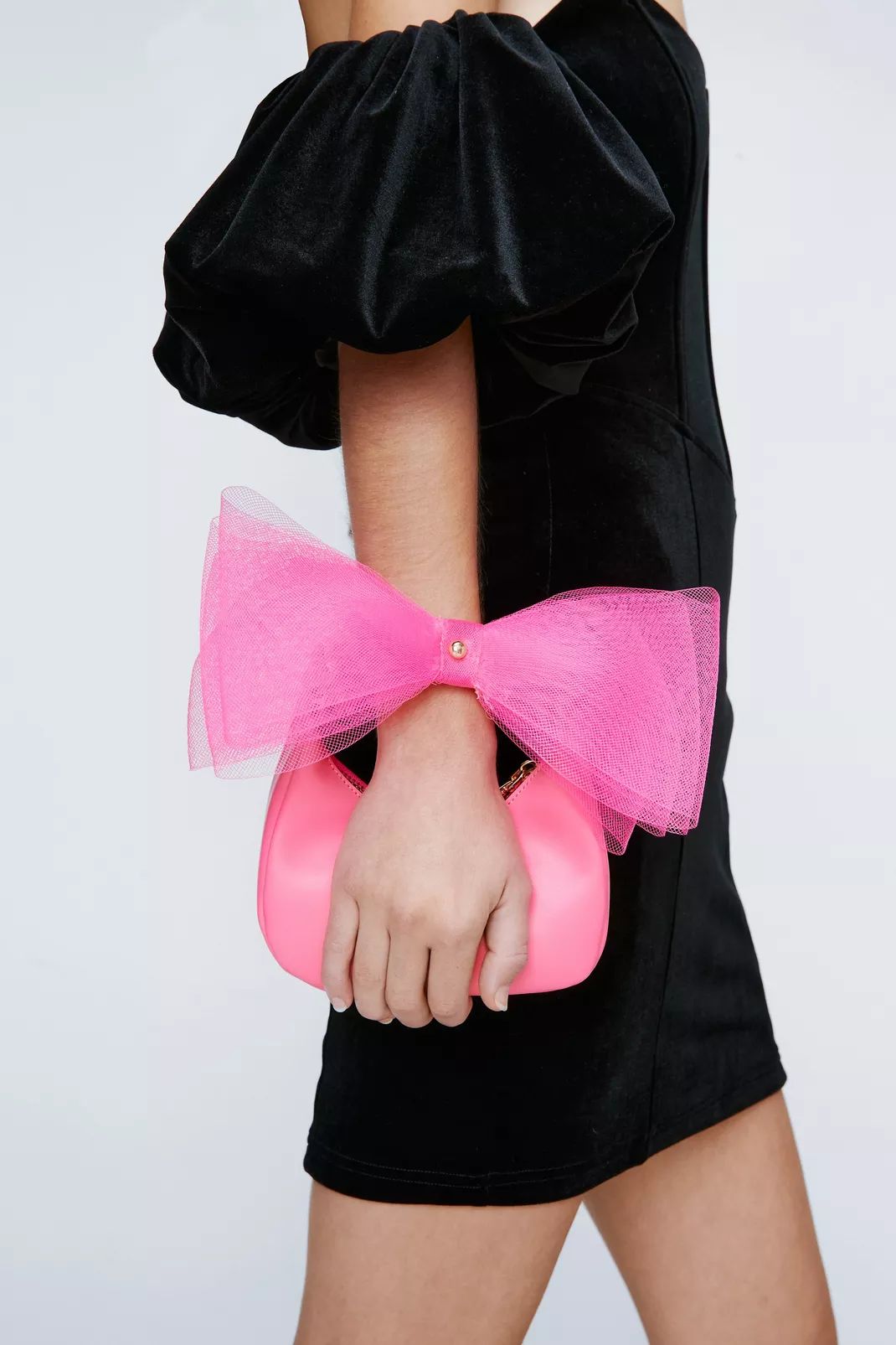 Oversized Bow Wristlet Handbag | Nasty Gal (US)