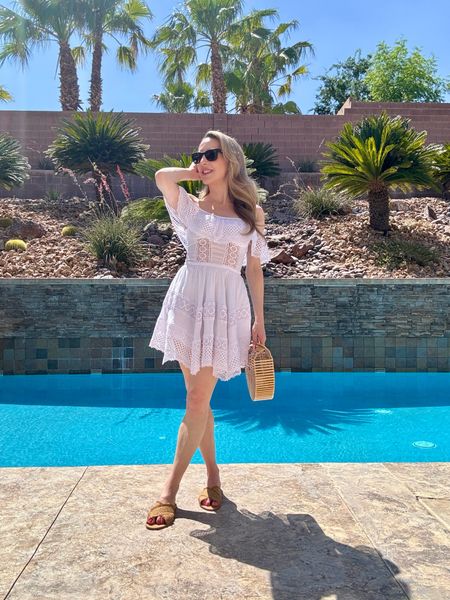 White summer dress, tan slide sandals, bamboo bag and Ray-Ban wayfarer smart sunglasses for pool day chic and hands free content and calls ☀️ 

#LTKStyleTip #LTKTravel #LTKSwim