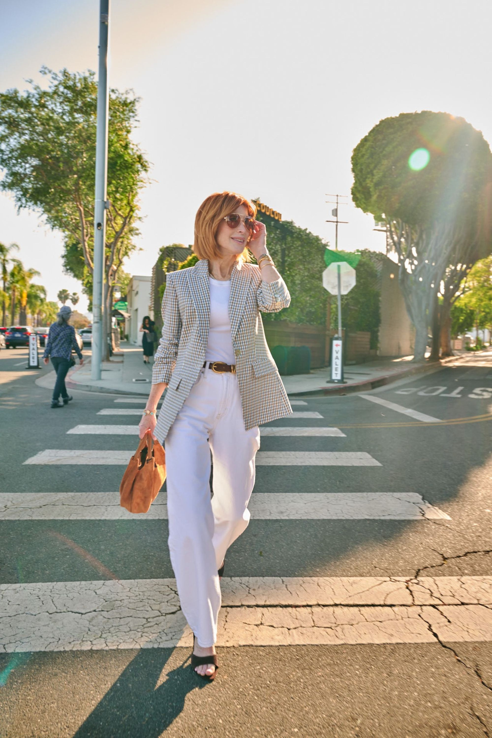 A checked blazer, white denim, and a simple tee is one of my favorite formulas for polished spring outfits 2026. This look feels effortless but still chic enough for business casual workwear, lunch dates, or casual meetings. XS in blazer and tee, 24 in jeans. 

 #LTKootd #LTKOver40 #LTKSeasonal
